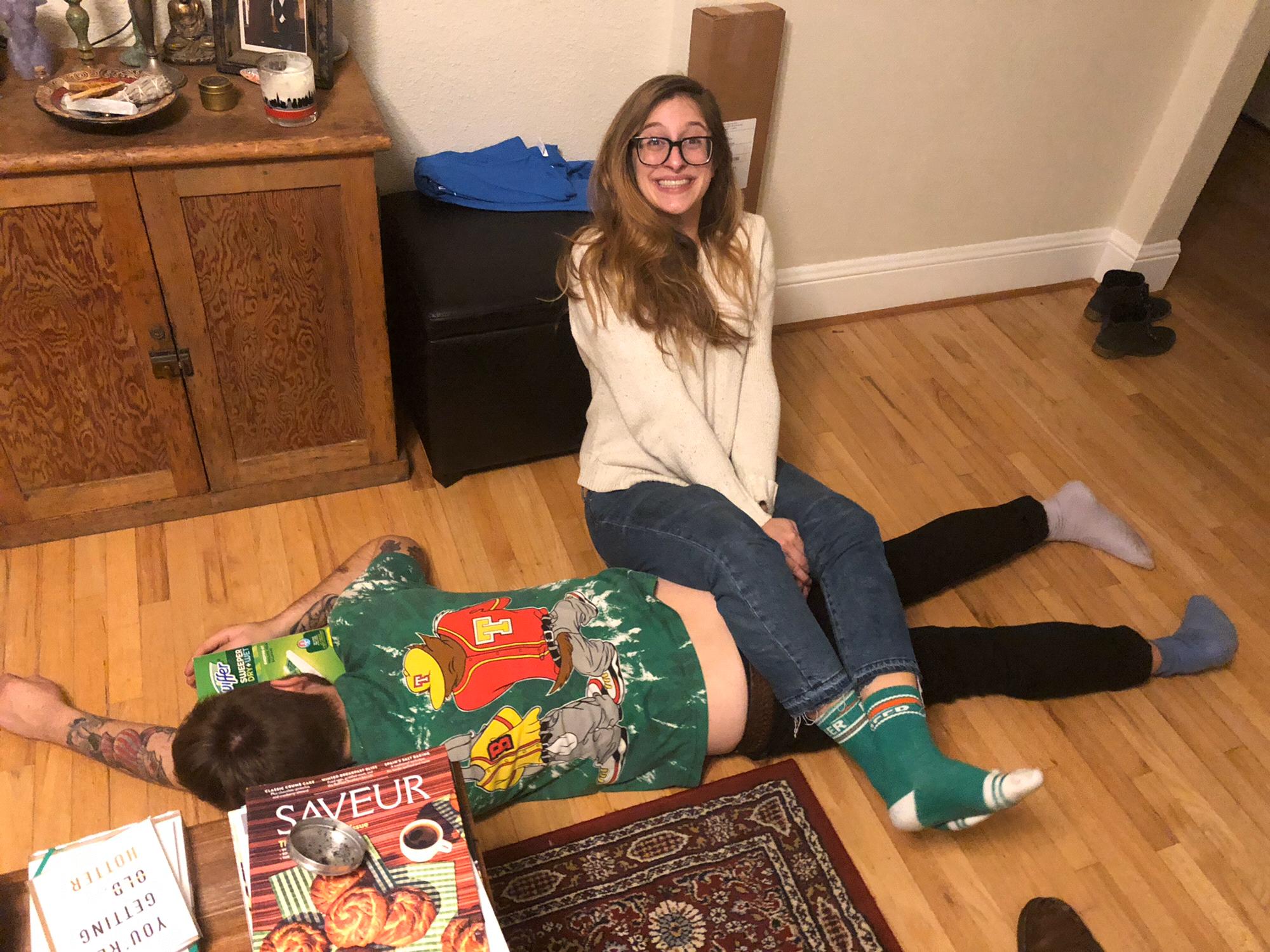 Why is our Officiant Melissa sitting on me in Portland? And why is she so happy about it!