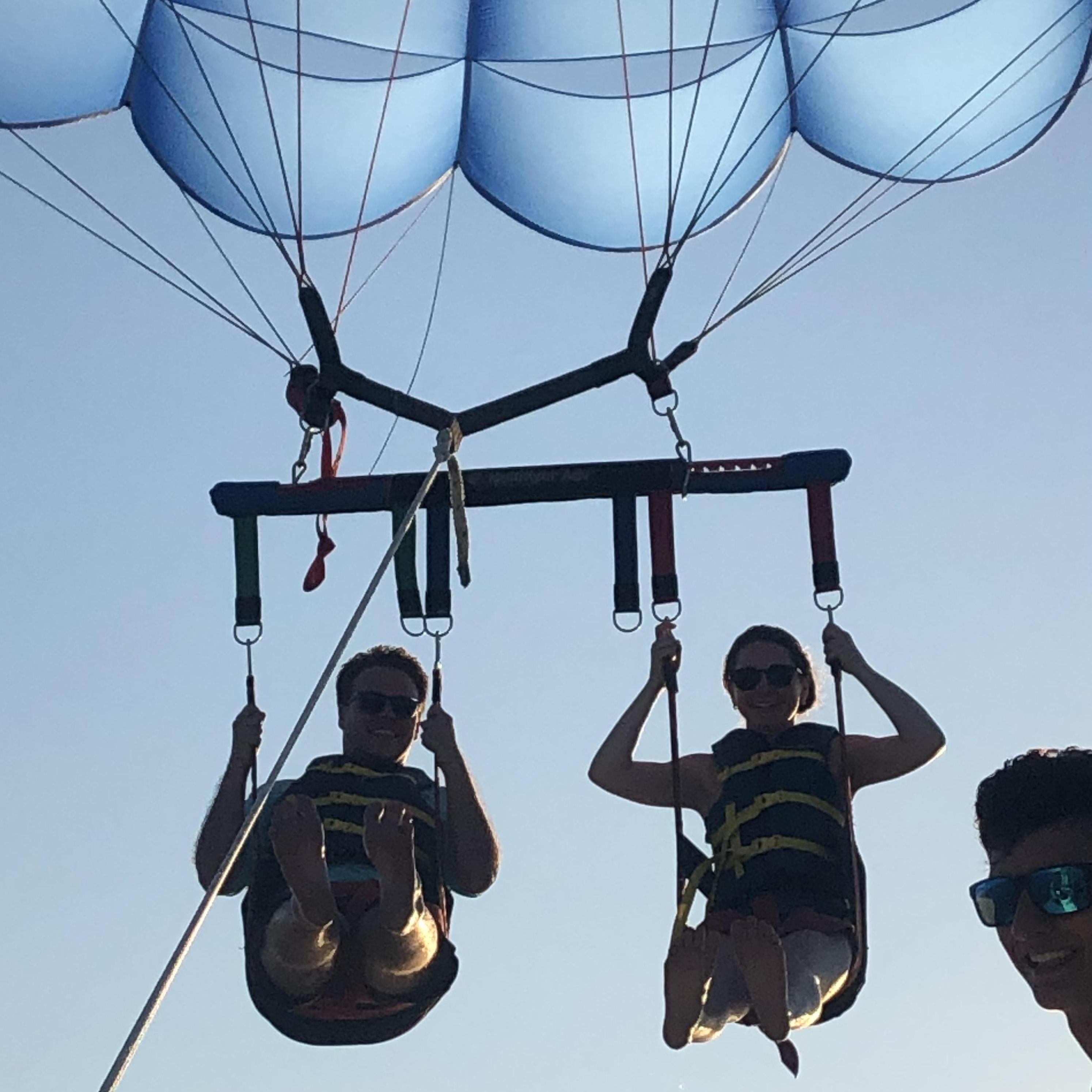 Surprise parasailing adventure during one of many beach trips!