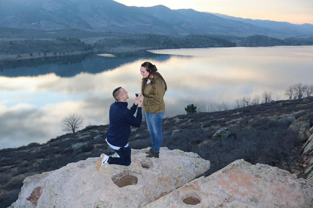 The purposal!! I kept saying that I wanted to go climb rocks and he kept saying no watch the sunset with me while behind us a photographer was getting set and my parents were hiding behind a rock!