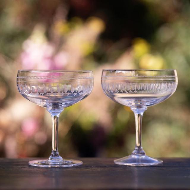 A Set Of Four Cocktail Glasses With Ovals Design