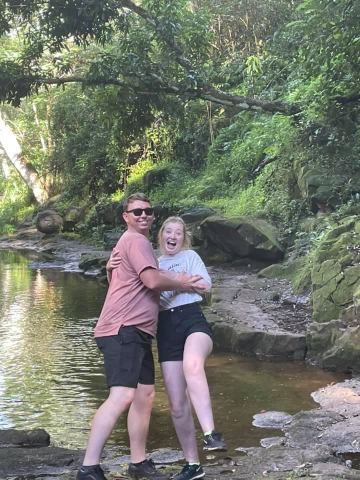 Still in Hawaii where Dylan’s pushing Megan into the water
