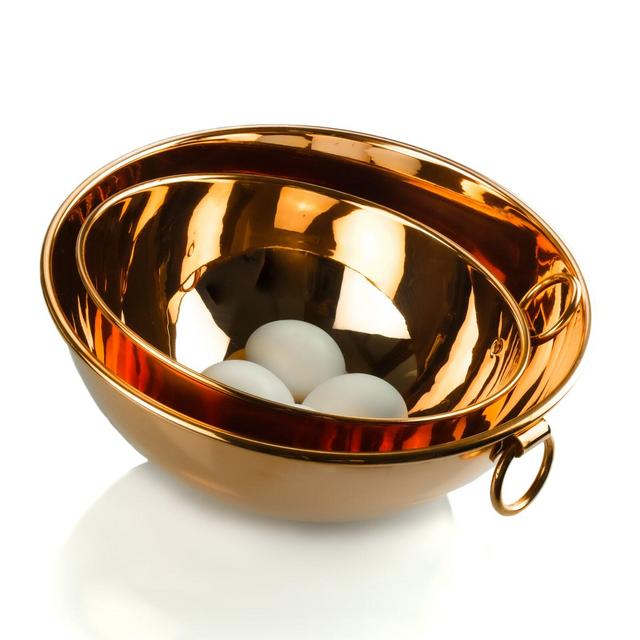 Copper mixing bowl with ring. Homemade mayonnaise in copper bowl for egg whites. Enriched with a ring handle. Exquisitely crafted by hand.