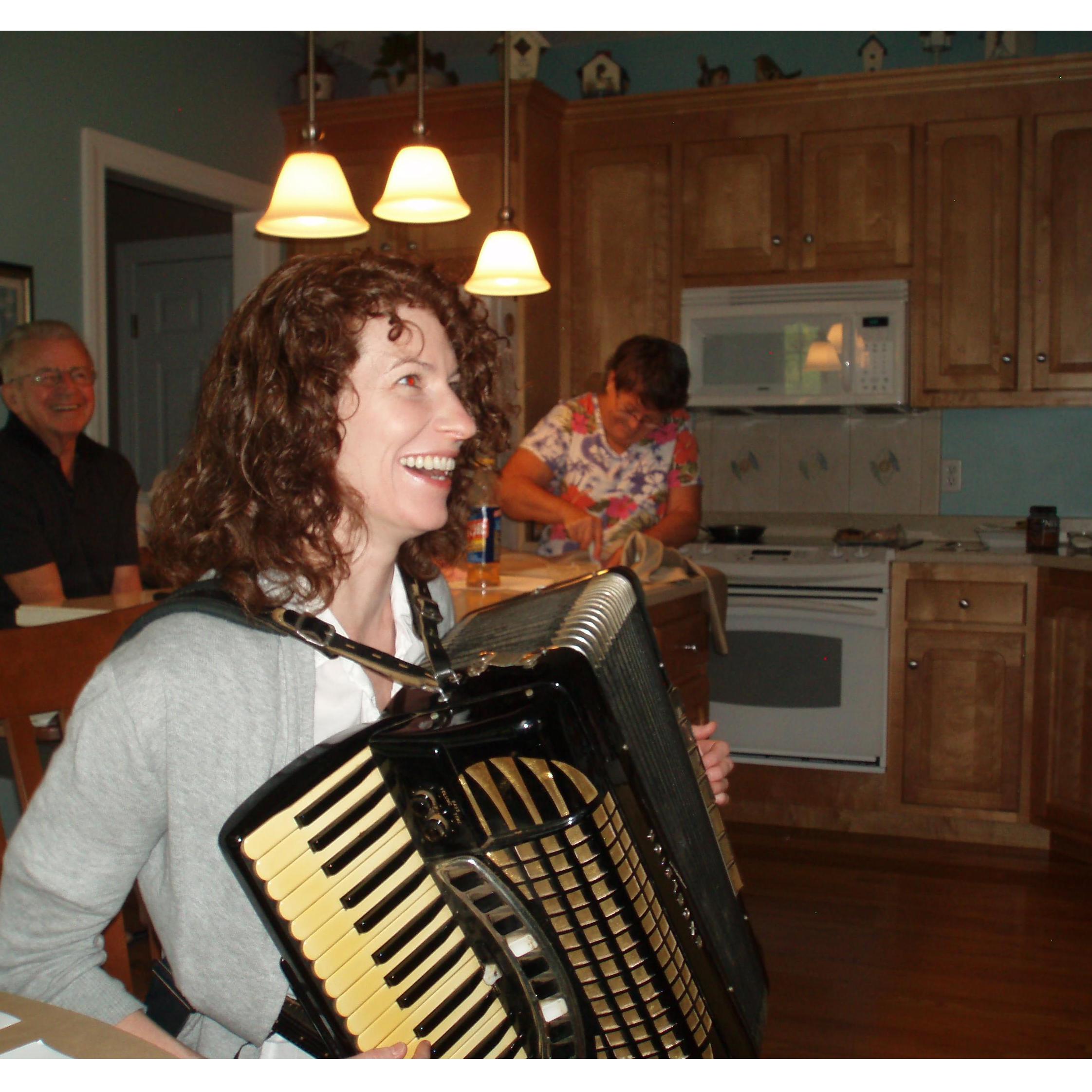 Trying to learn accordion from Stephen's dad, Victor.