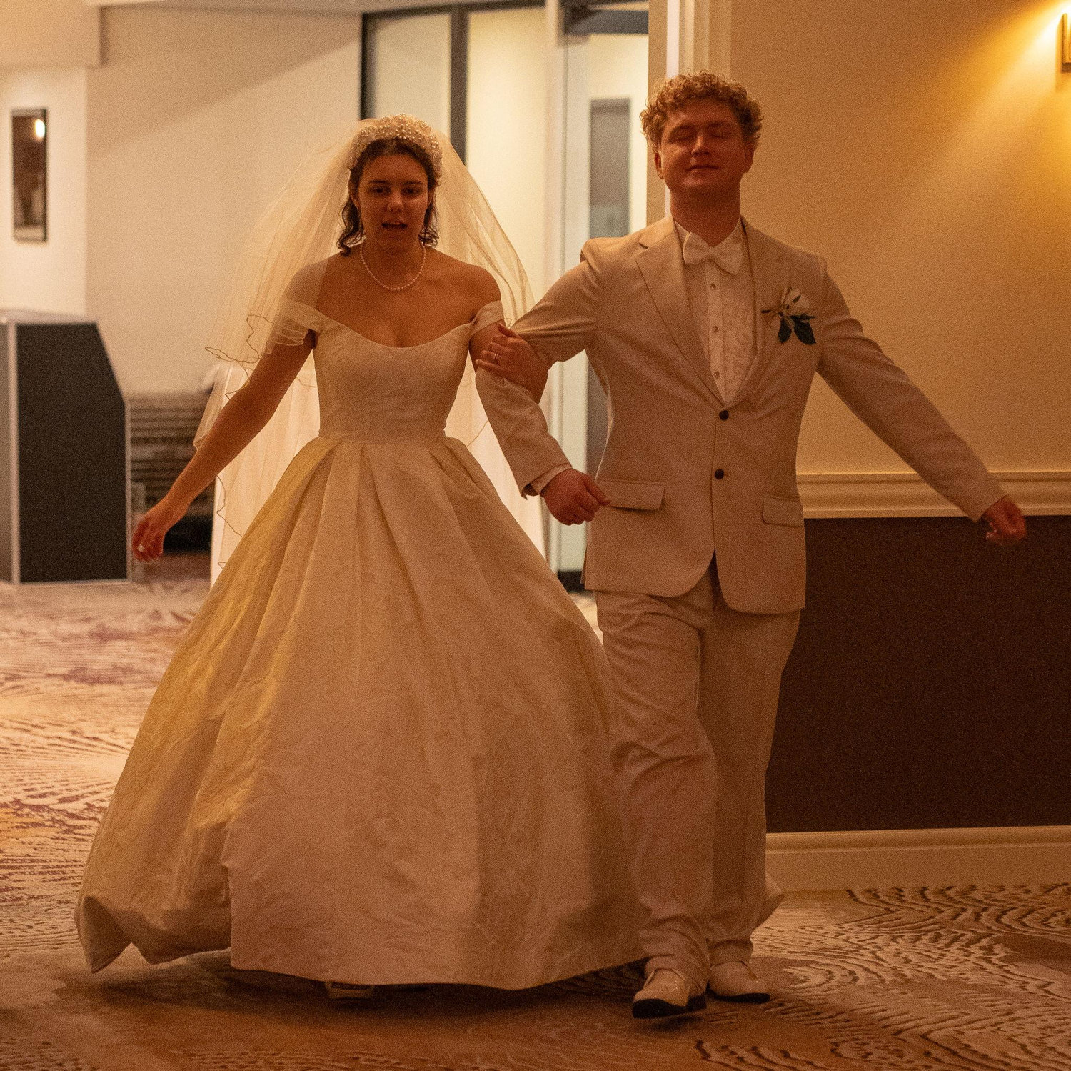 Entering our reception as husband and wife
