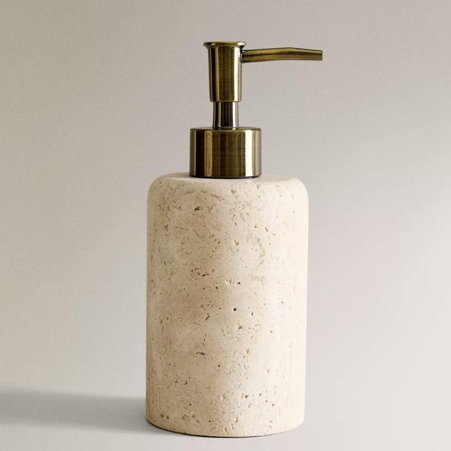 Beige soap dispenser
