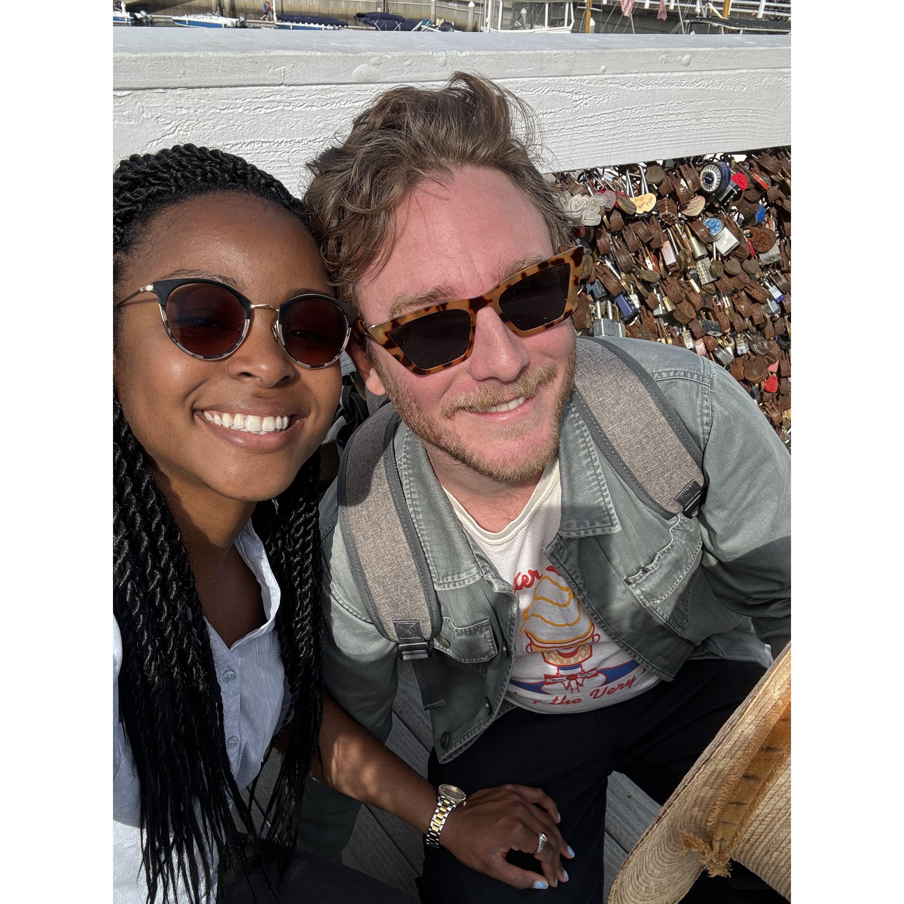Putting a love lock on the bridge at The Shoreline Village in Long Beach
