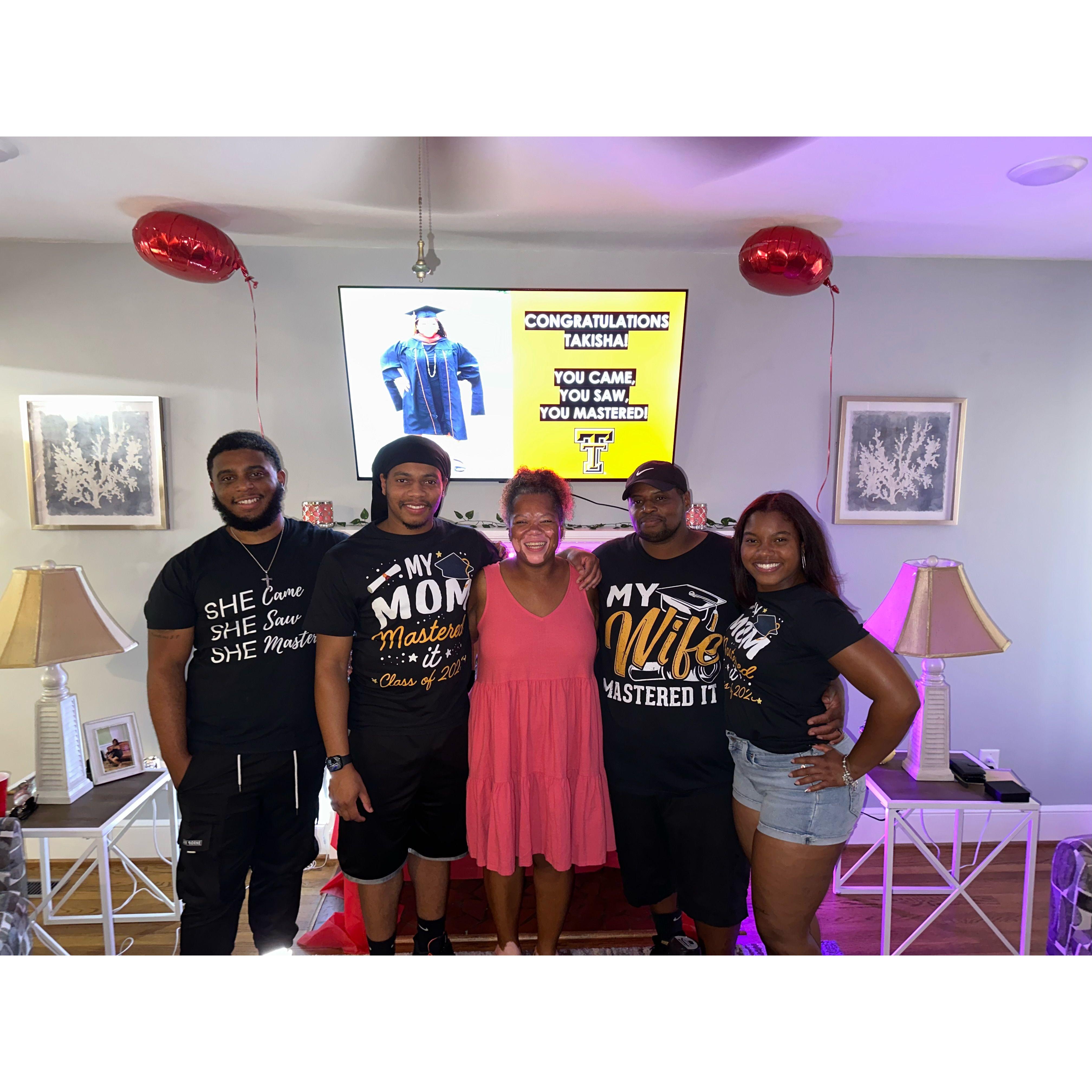 Destini, Robert, Keyshawn, and Kevin celebrate Takisha's Master's Degree!