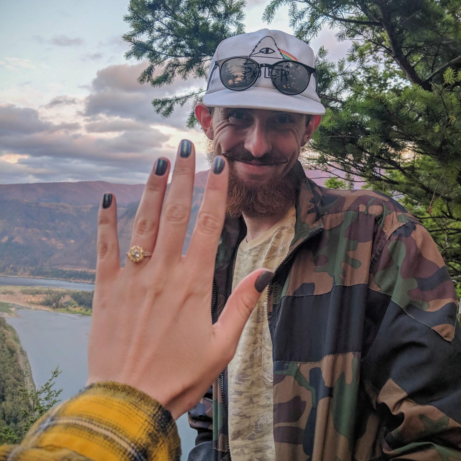 The "she just said YES" look.