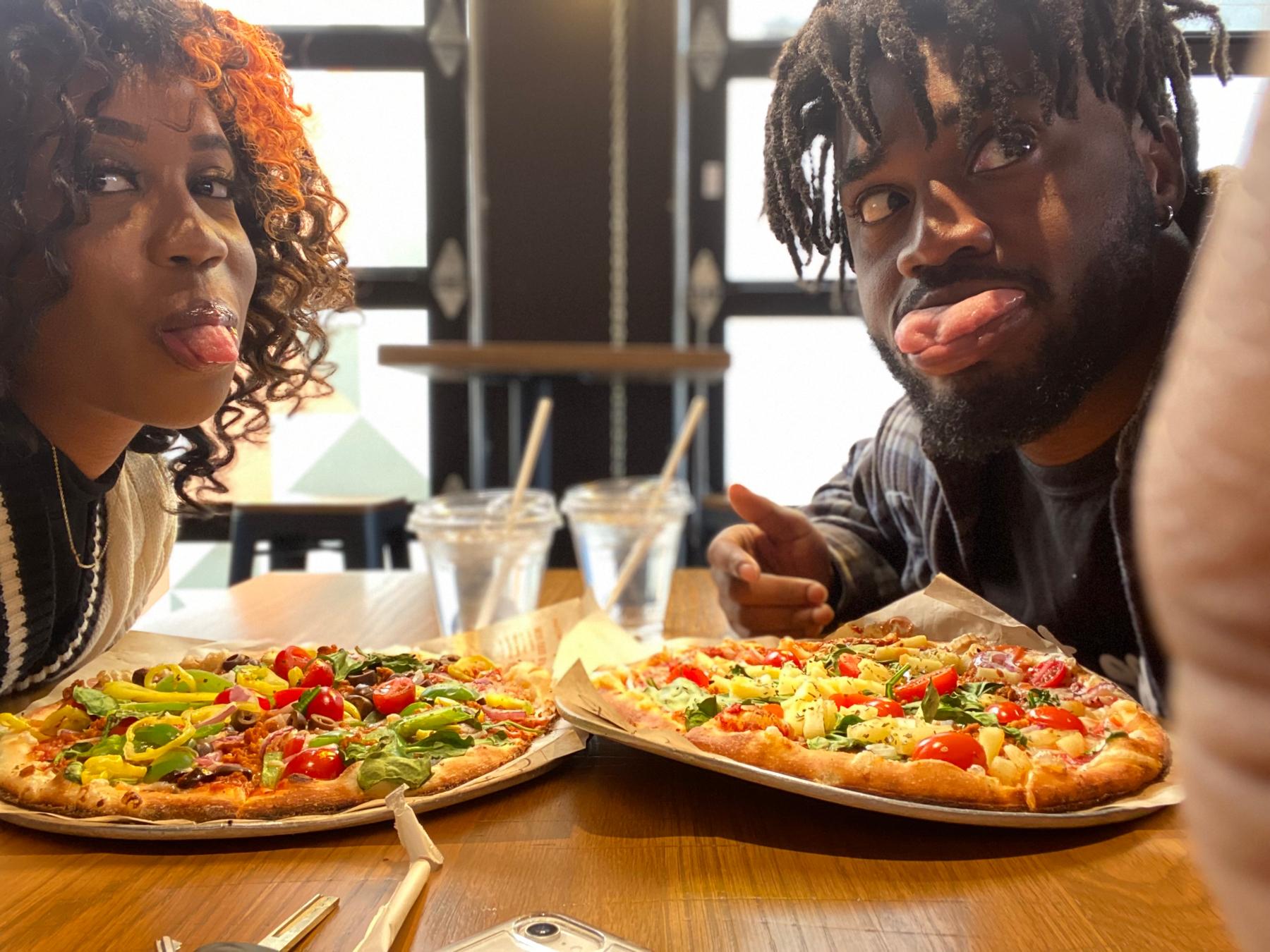 Asha’s first time trying vegan pizza during our fast!