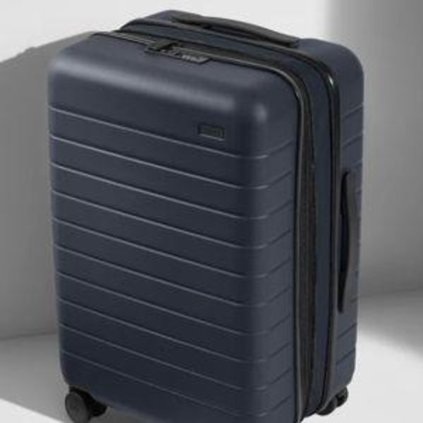 The Bigger Carry-On Flex in Navy Blue