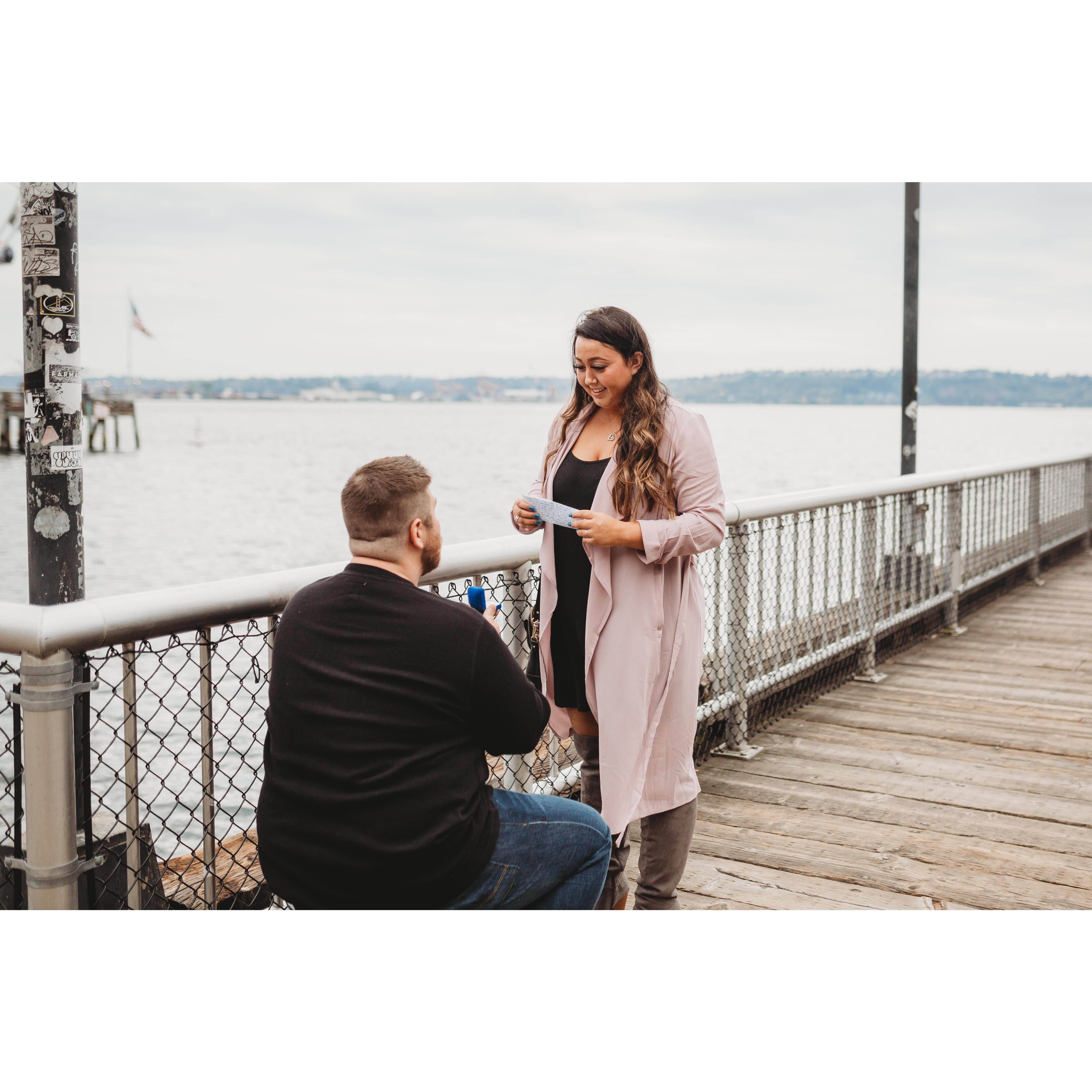He popped the question!!! Joe hired a photographer to capture this special moment.