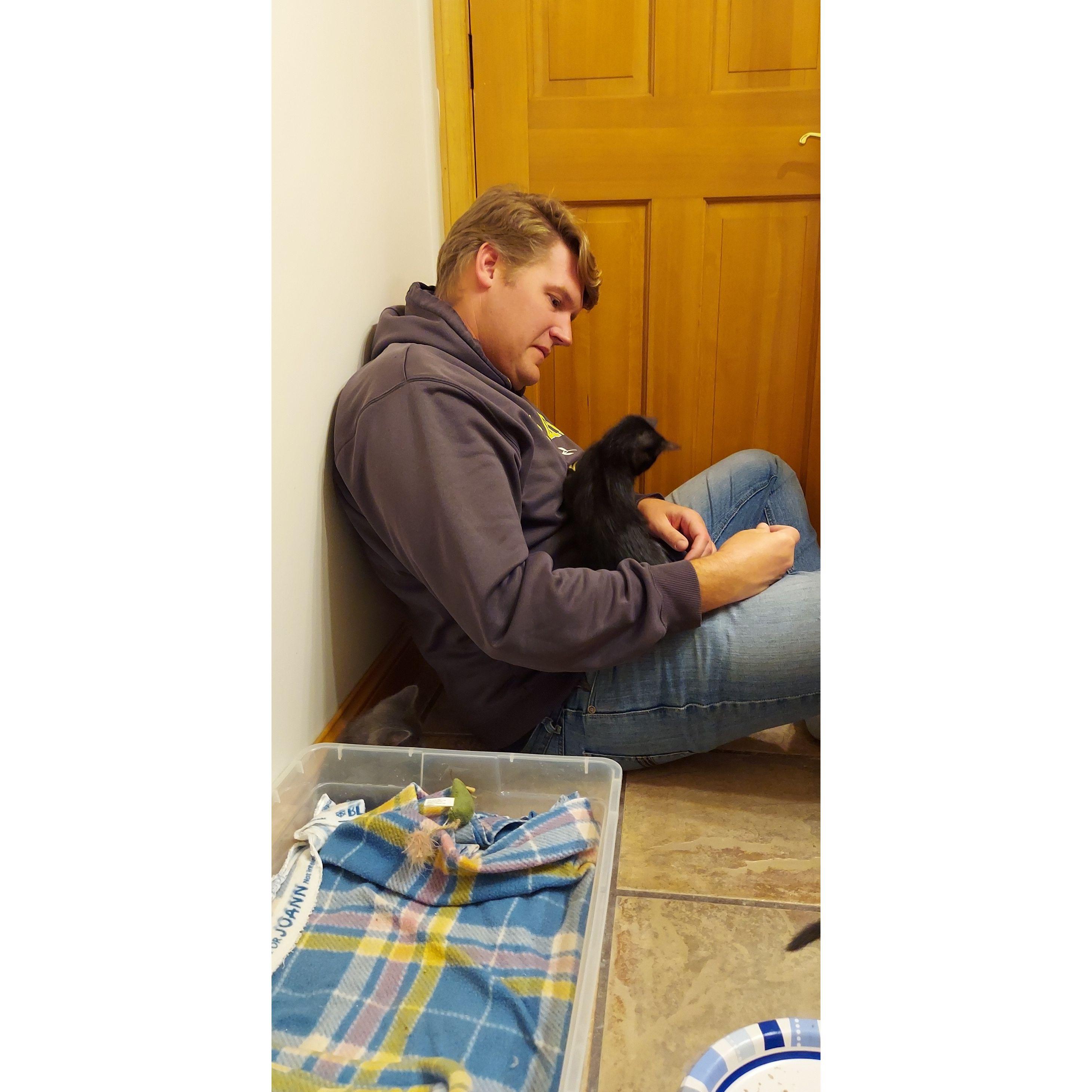 We took in a stray cat who then had kittens. Brady quickly made friends with the little void kitty.