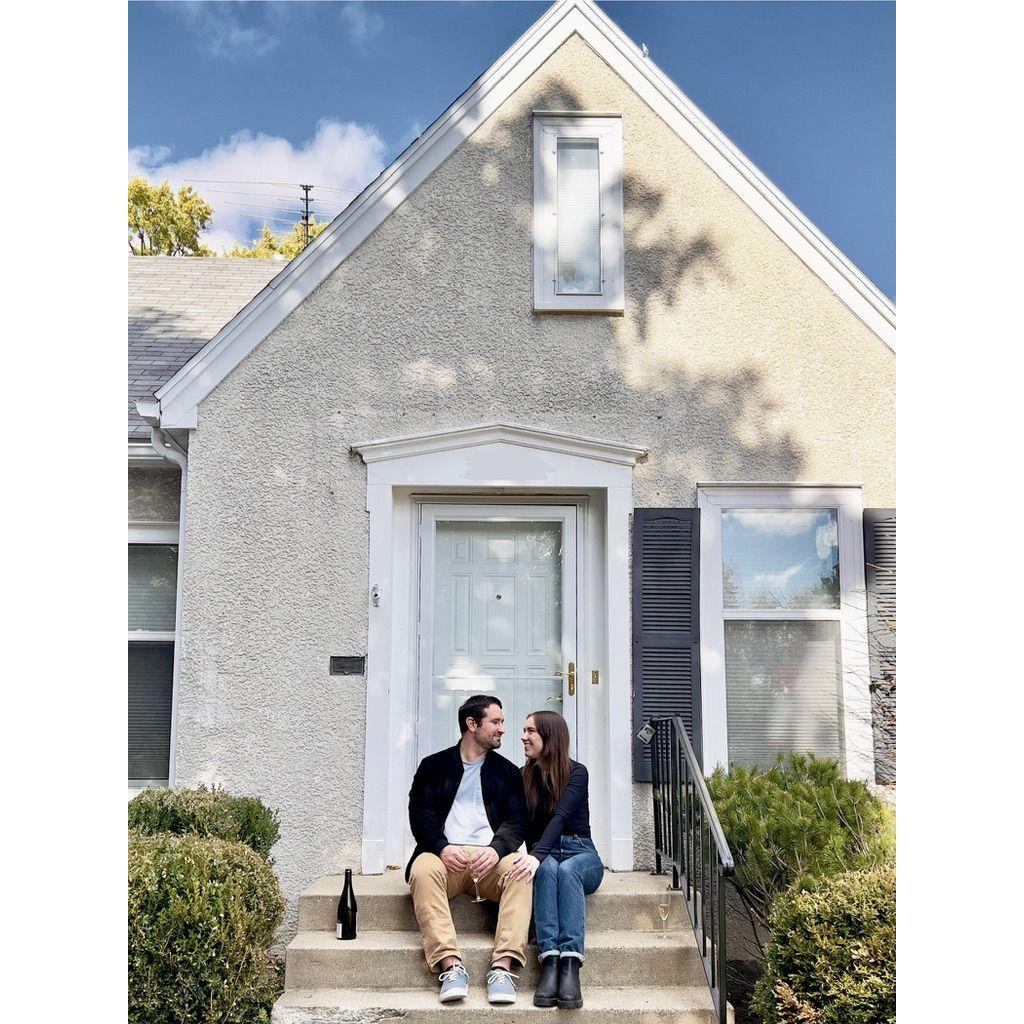 October 2023: In front of our new house.