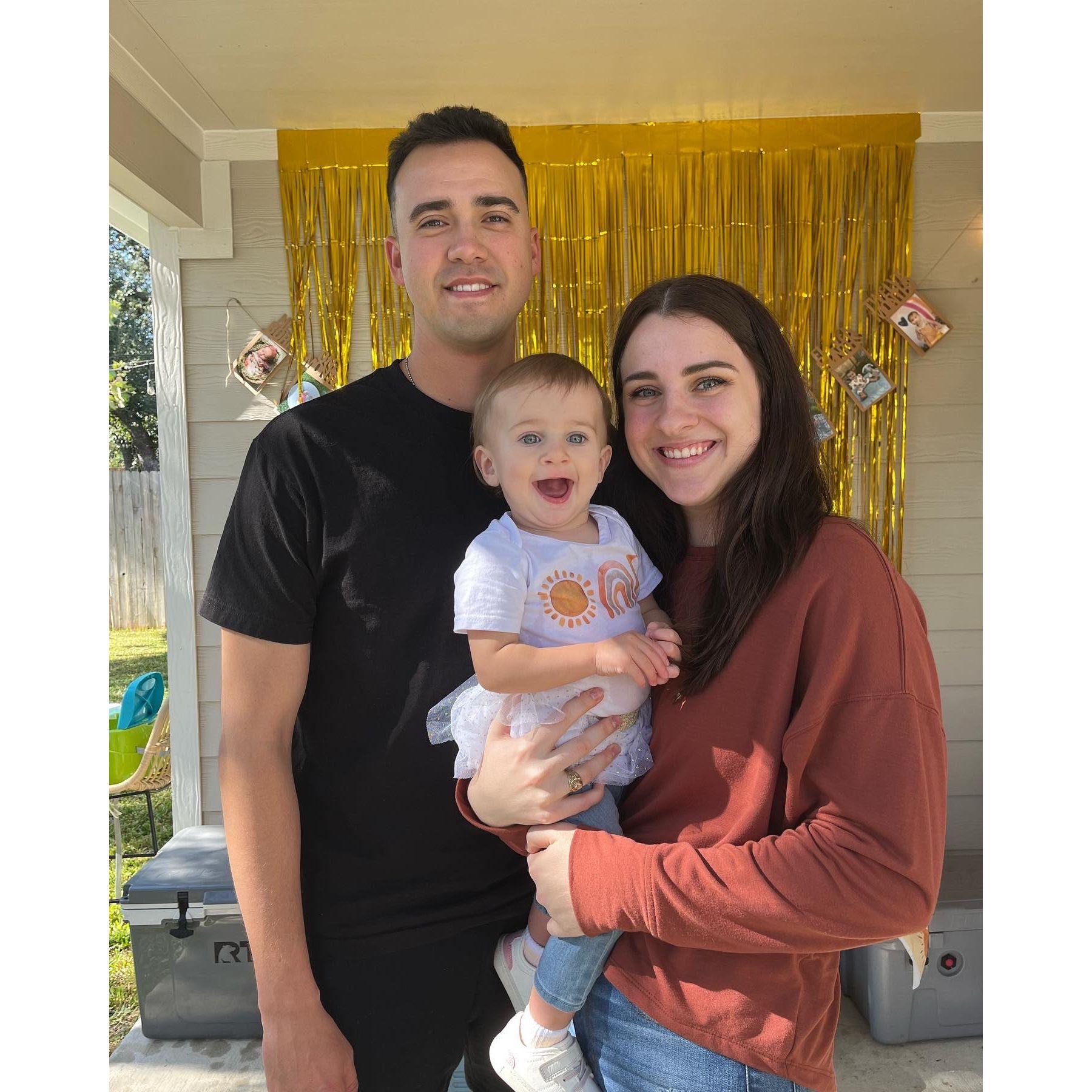 Uncle Joshie and Aunt RayRay at Carsen's first birthday!