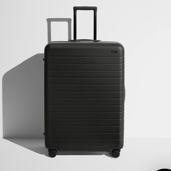 Shop Large & Checked Suitcases in Coast Black | Away