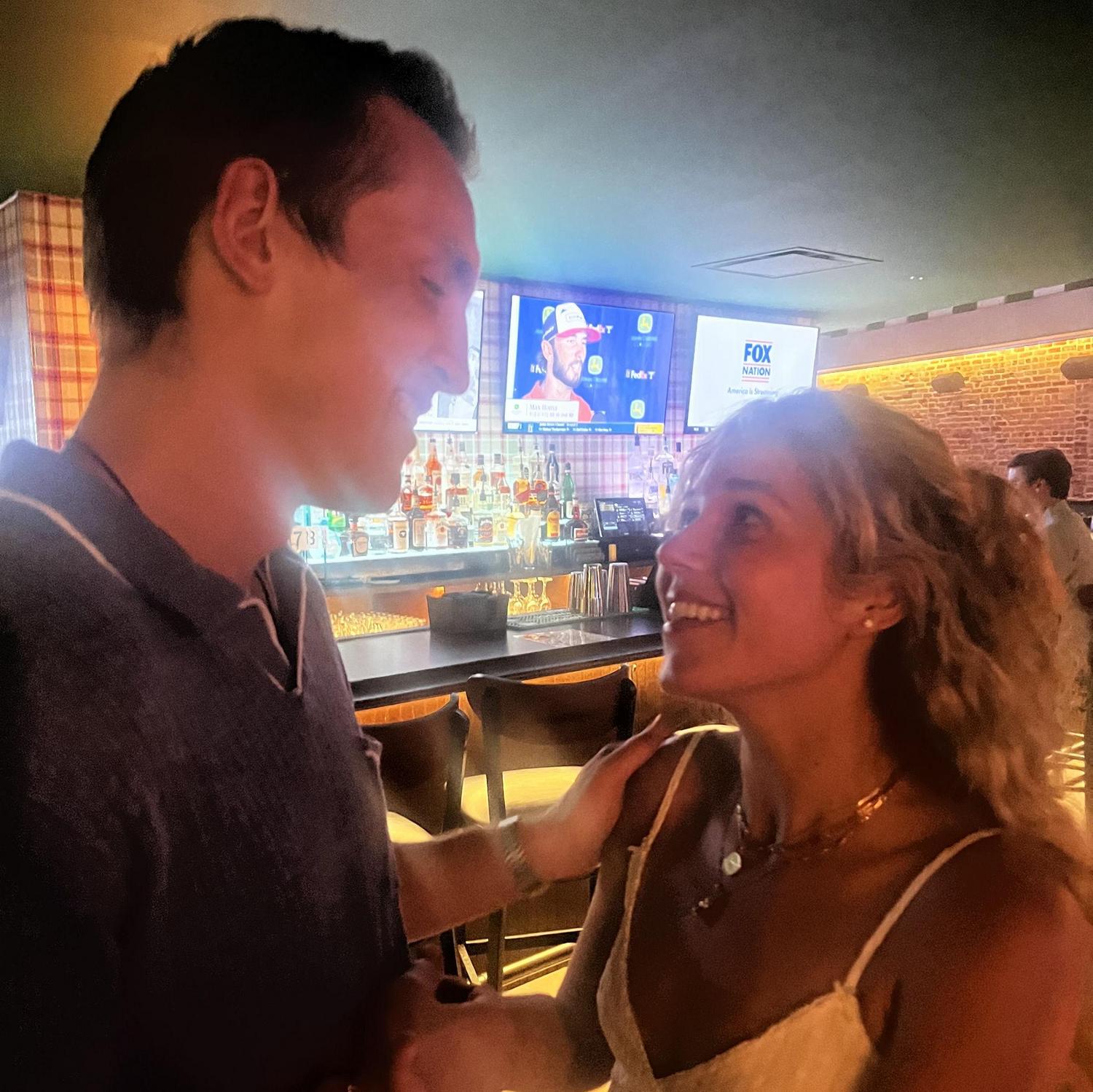 The first ever pic as a couple—thanks Greg!