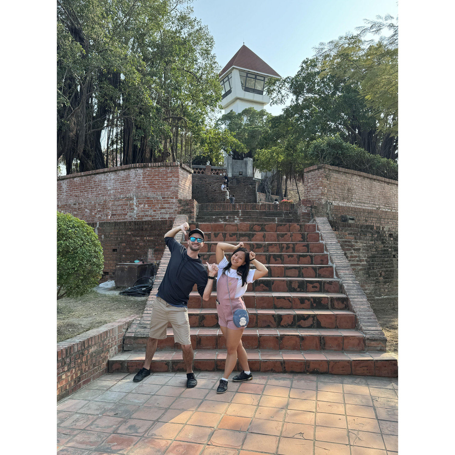 Trying out some of the fun poses we saw from a tour group during our first trip to Taiwan together.