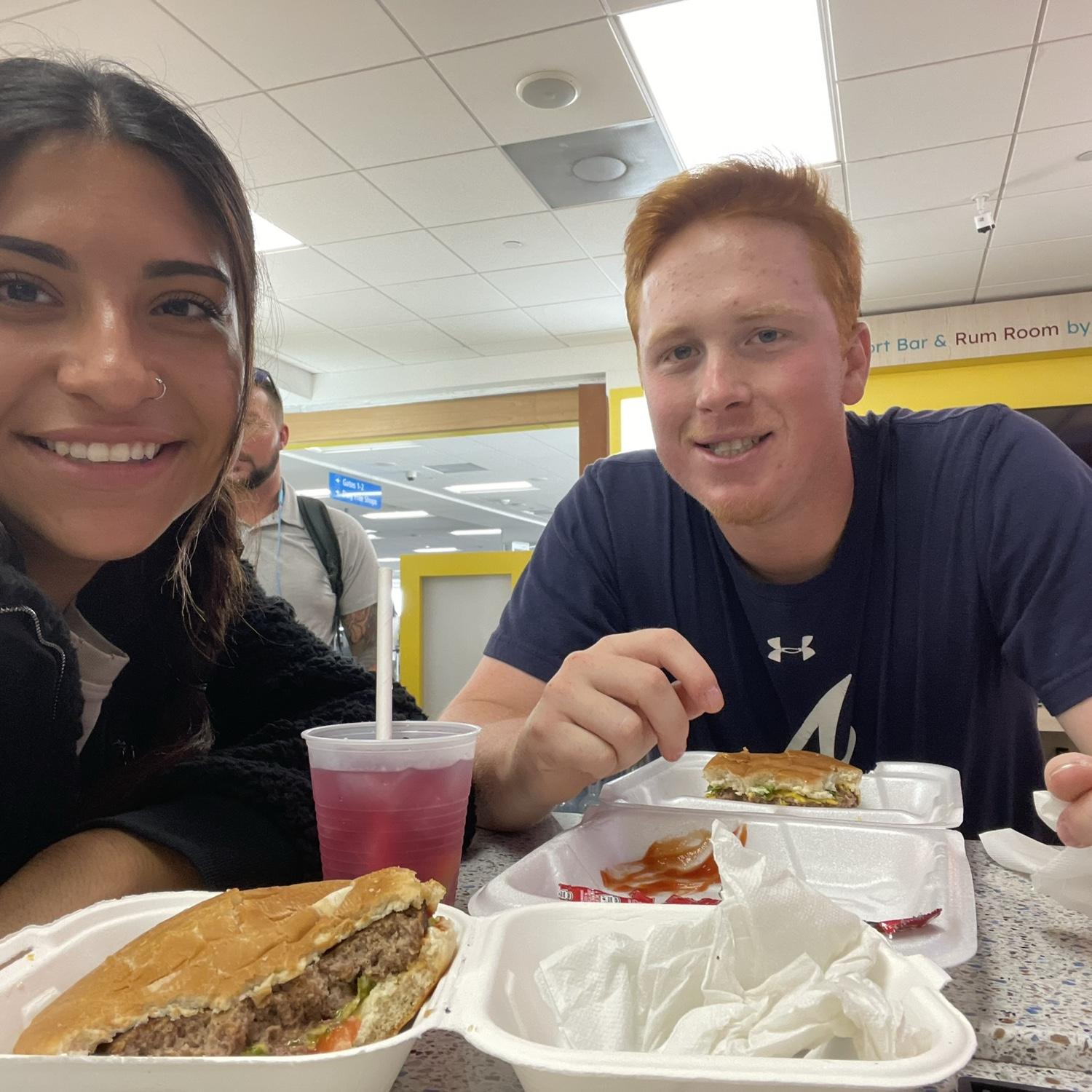 Us choking down the terrible airport food in St. Thomas.