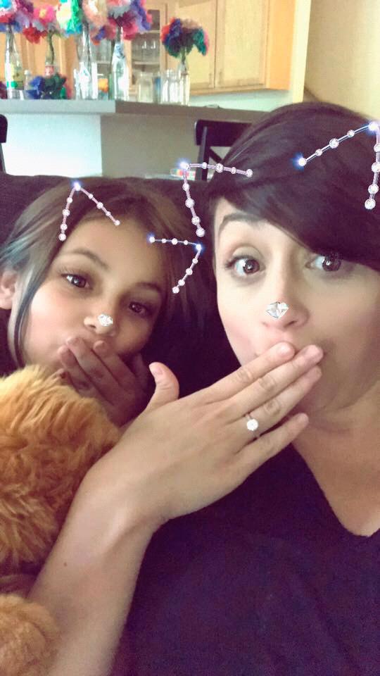 First day home from London, Eva definitely approves of mom's new jewelry.
