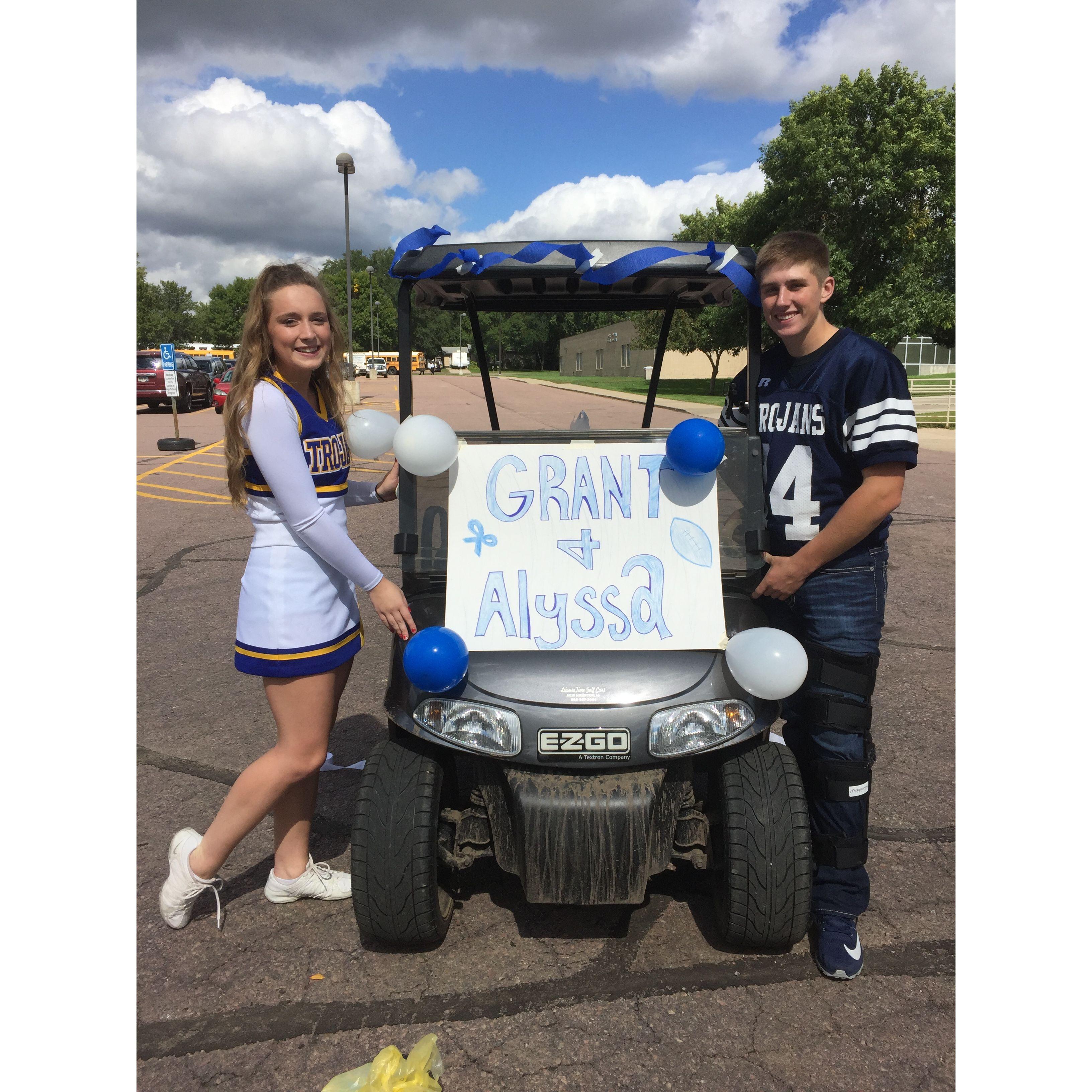 Senior year homecoming royalty - ready to drive in the parade!