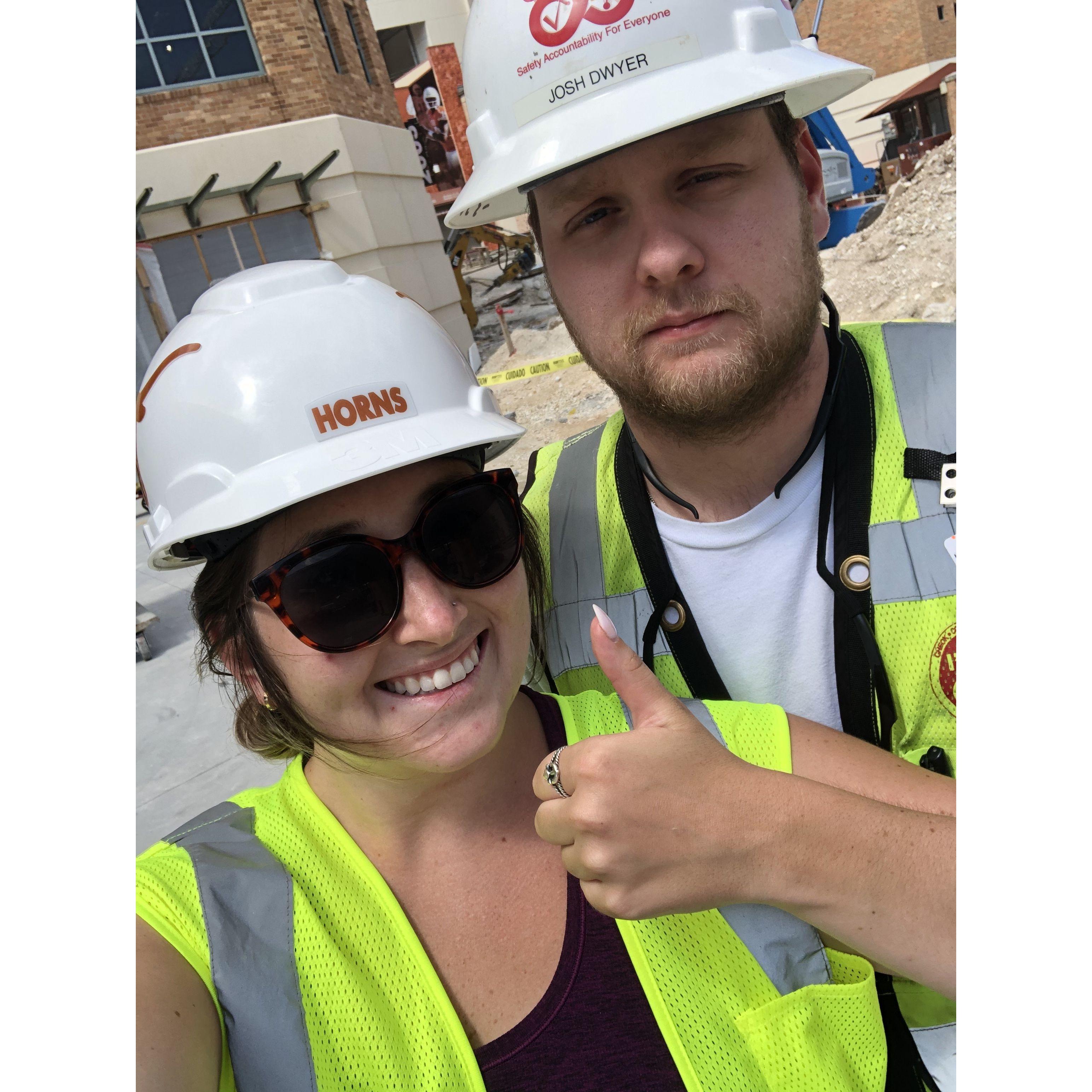 Josh taking Kate on a tour of his job site