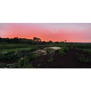 Waterfall view with sunset at wedding venue.