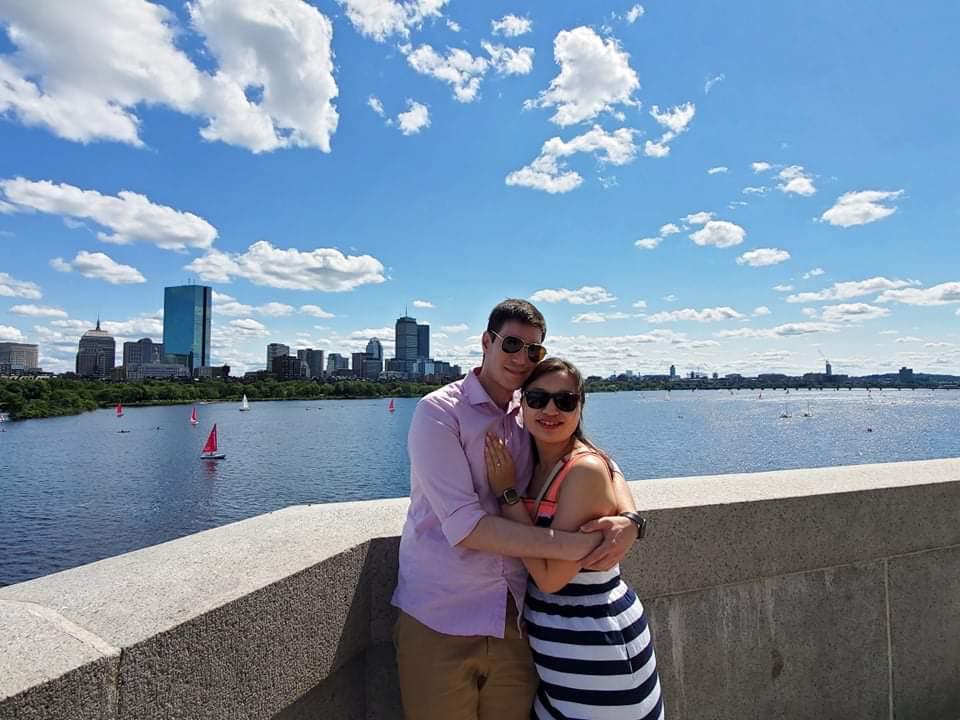 Walking across the Longfellow Bridge with the Boston city skyline in the background