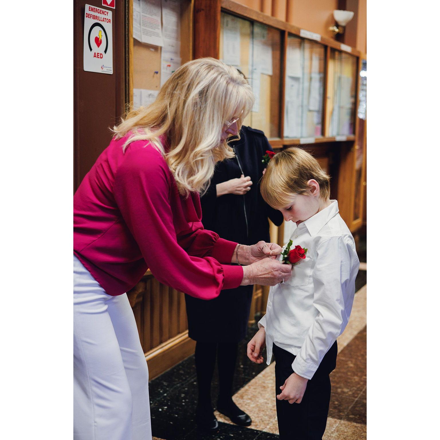 Jamie getting some help from Mamash (Vera's mom) with his boutonniere.