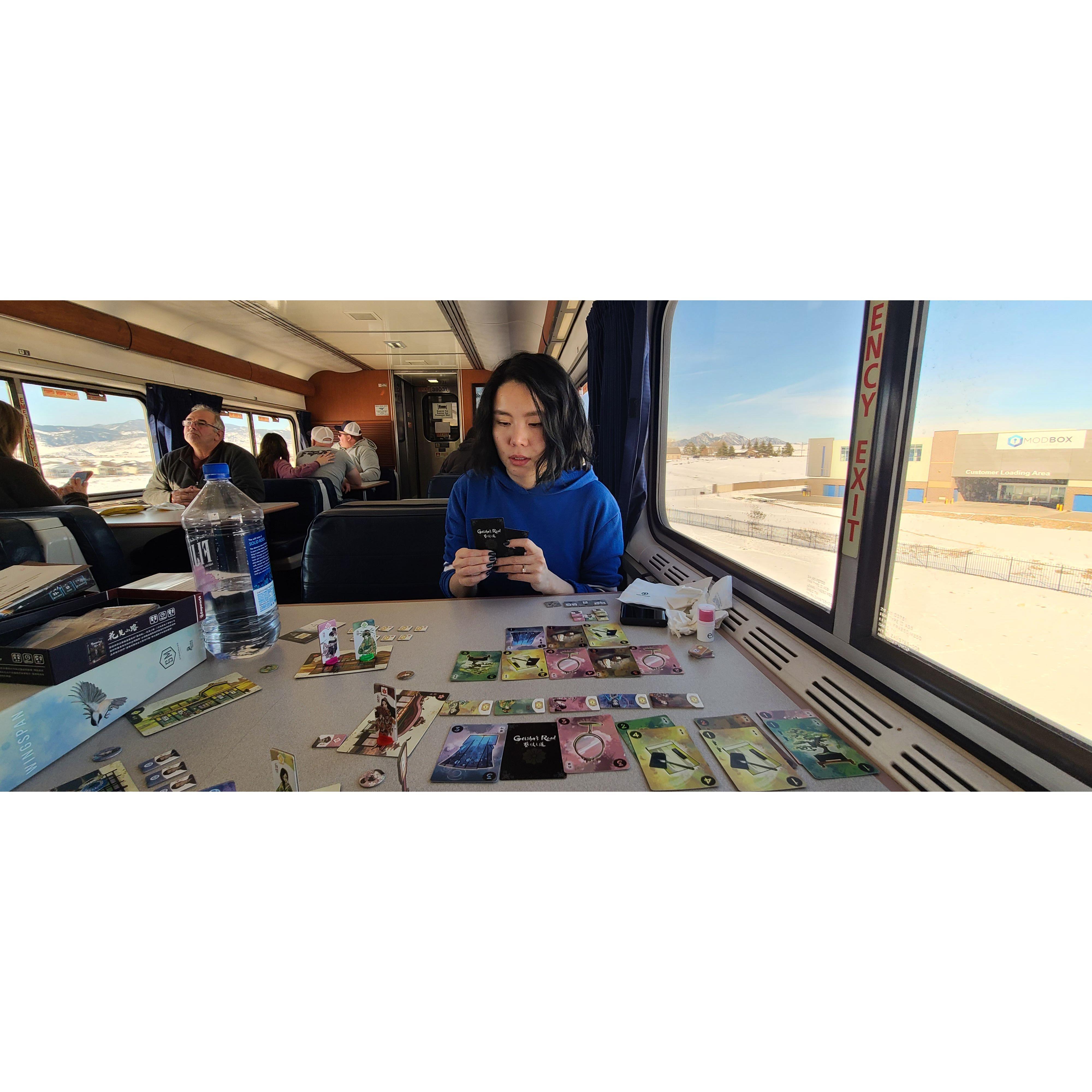 Playing boardgames on the California Zephyr, a beautiful 3-day train from Chicago to San Francisco. [Feb 2023]