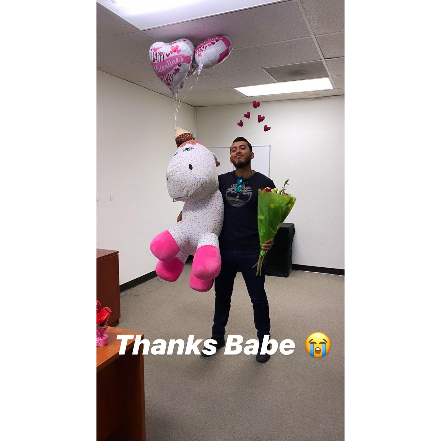 Our first Valentine's Day together, Roman surprised me at the office with a gigantic stuffed unicorn and flowers, February 2020.