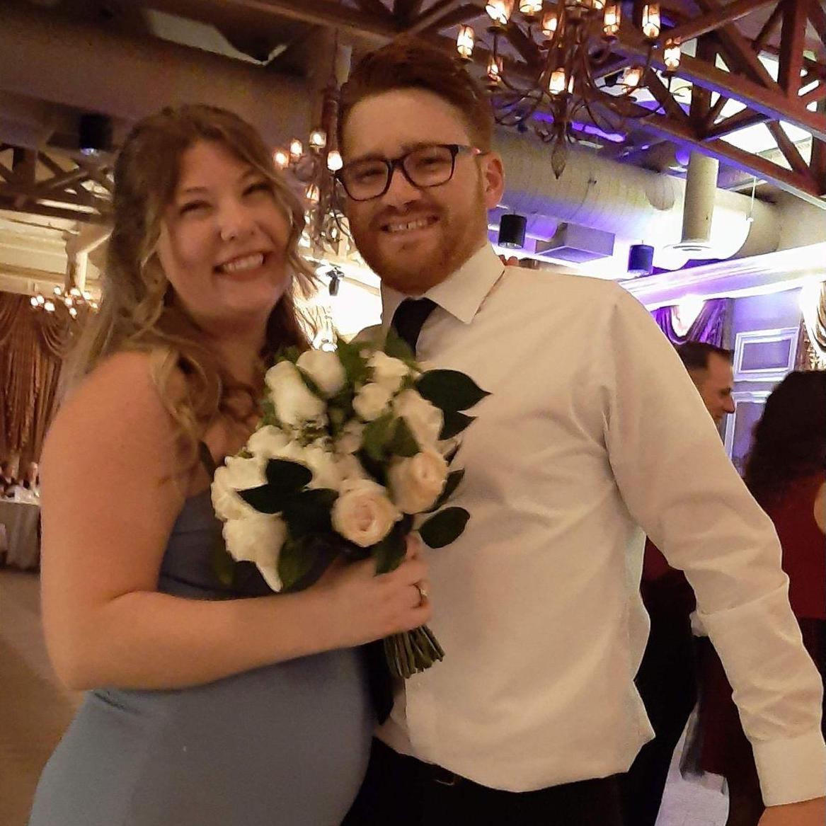 Catching the bouquet at Brandon and Sara's wedding - November 2022