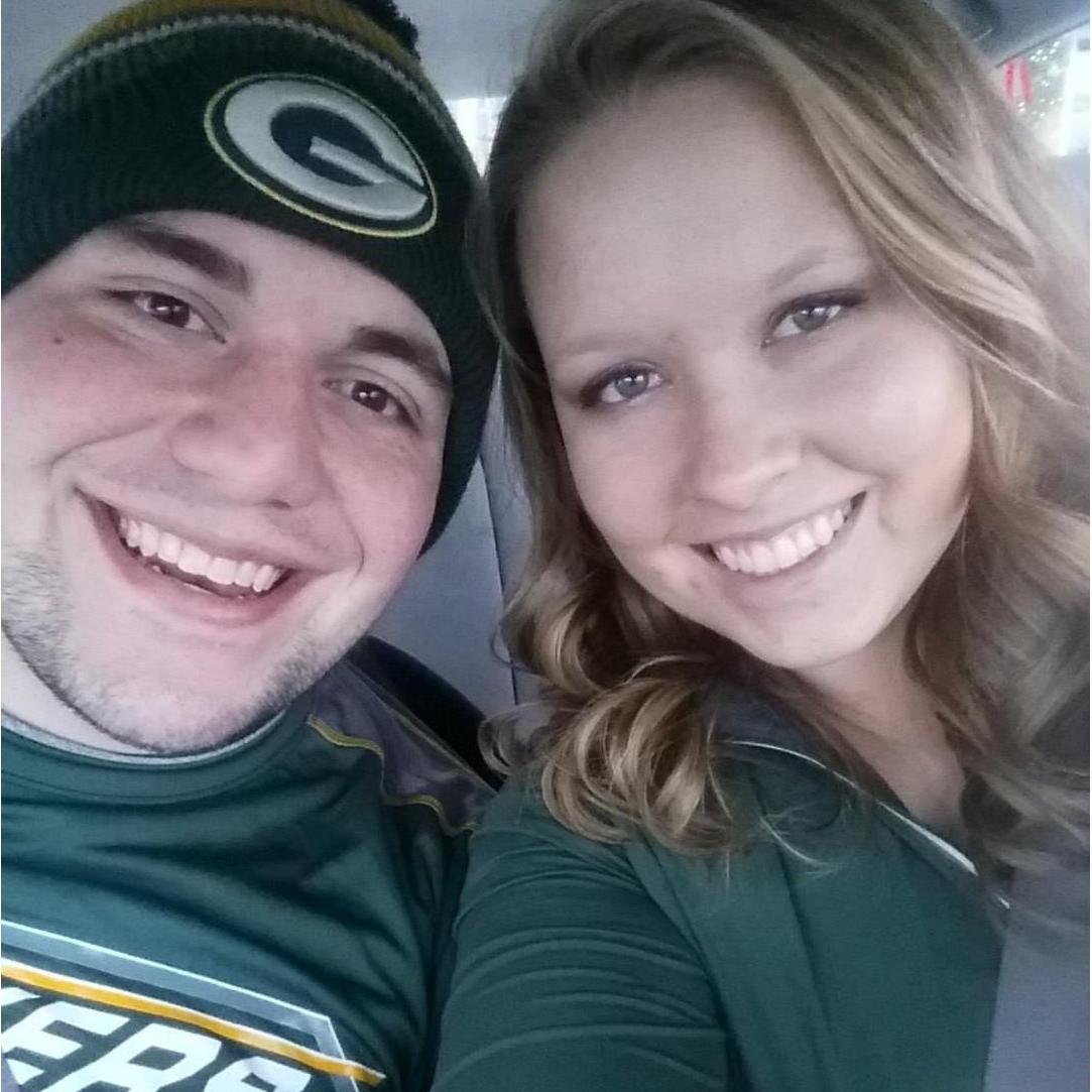 Yes, that is Antonio in a PACKERS shirt and hat. Our first game at Lambeau!