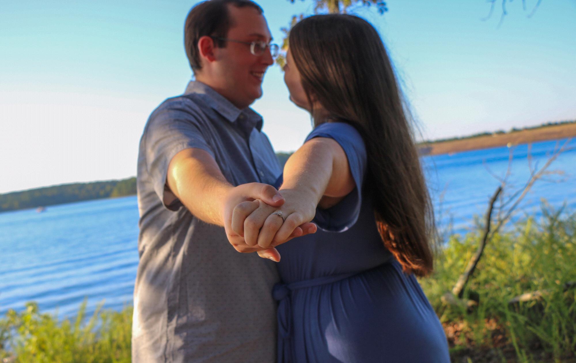 One of our engagement photos taken where Caleb proposed, Lake DeGray! Taken September 2020