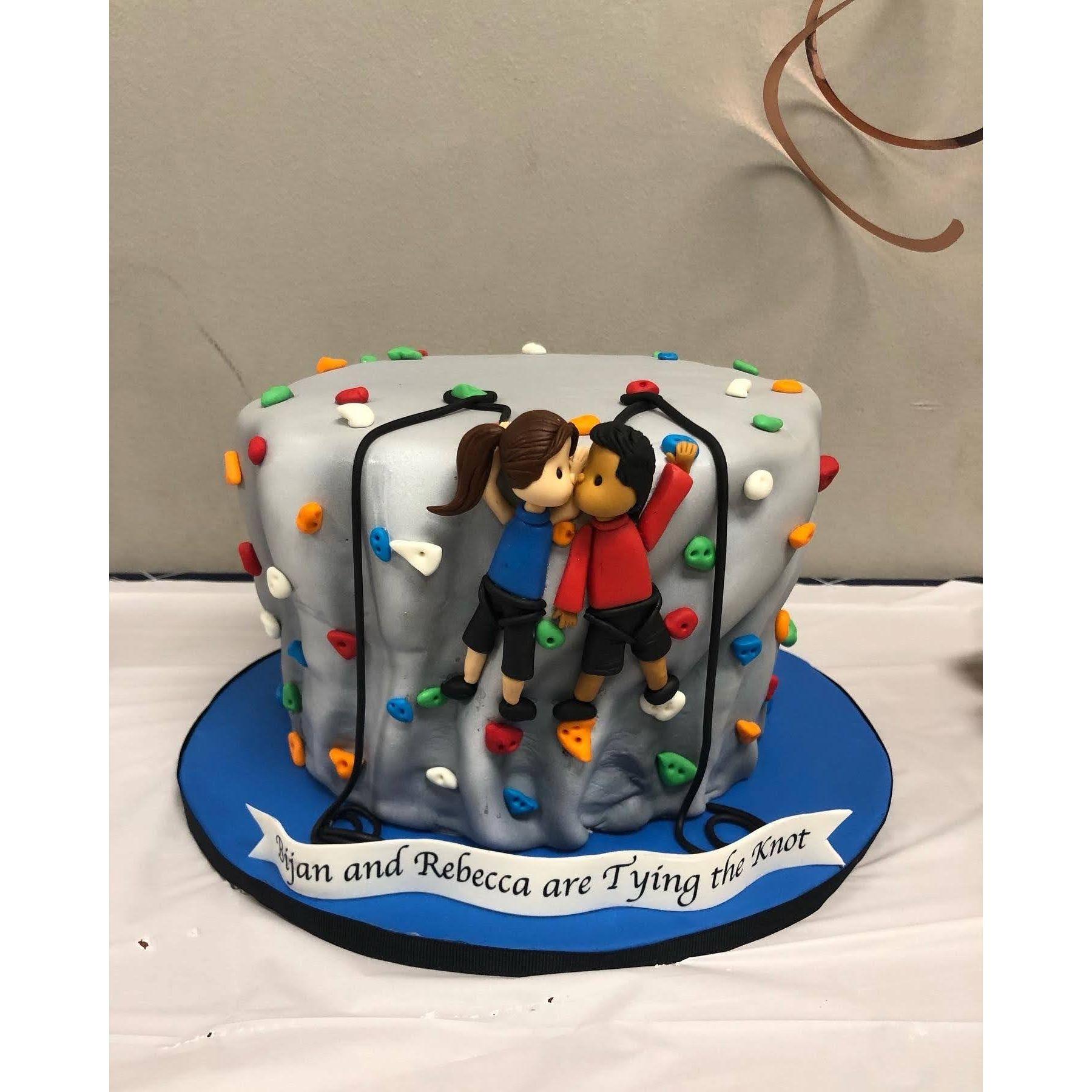 This is the cake from Rebecca's proposal to Bijan! Rebecca proposed to Bijan at his favorite place - the rock climbing gym!