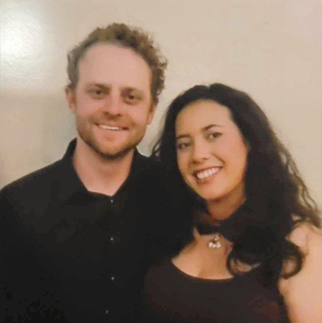 Our first photo together — taken at Luke & Abby's wedding minutes before we officially became girlfriend and boyfriend!