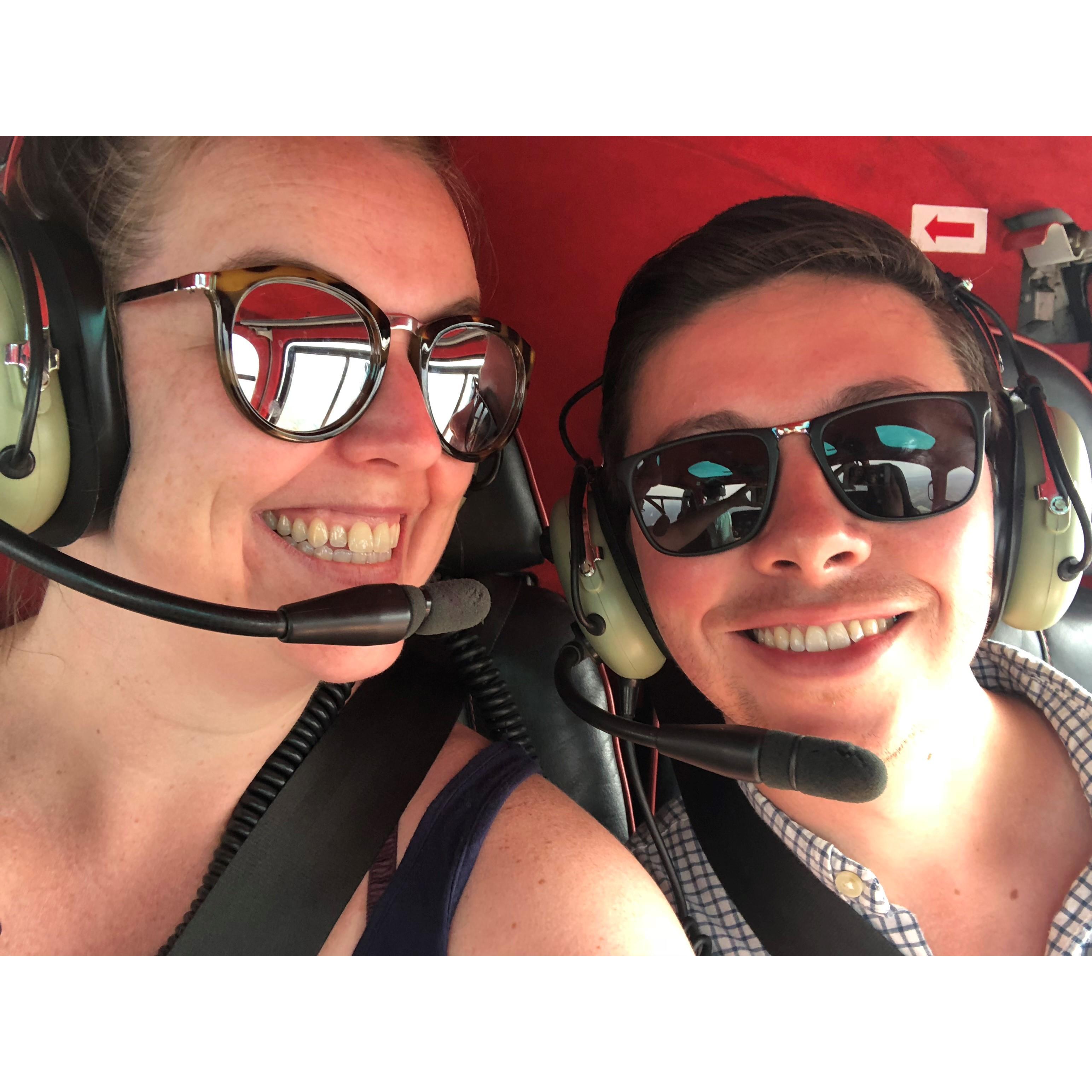 Erin's first and only time in a helicopter. Note the deranged smile masking the sheer terror. Cambodia - January 2018