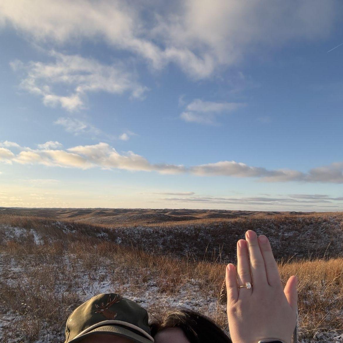 Overlooking the sandhills at sunset after engagement
