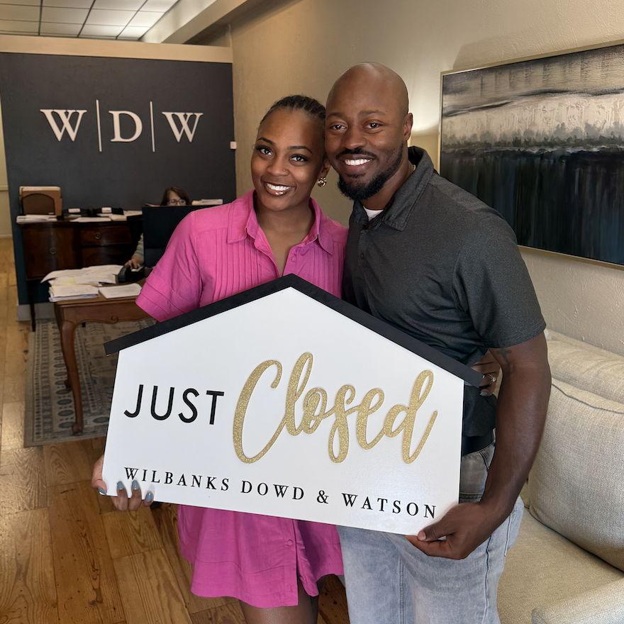 Us closing on our first home.