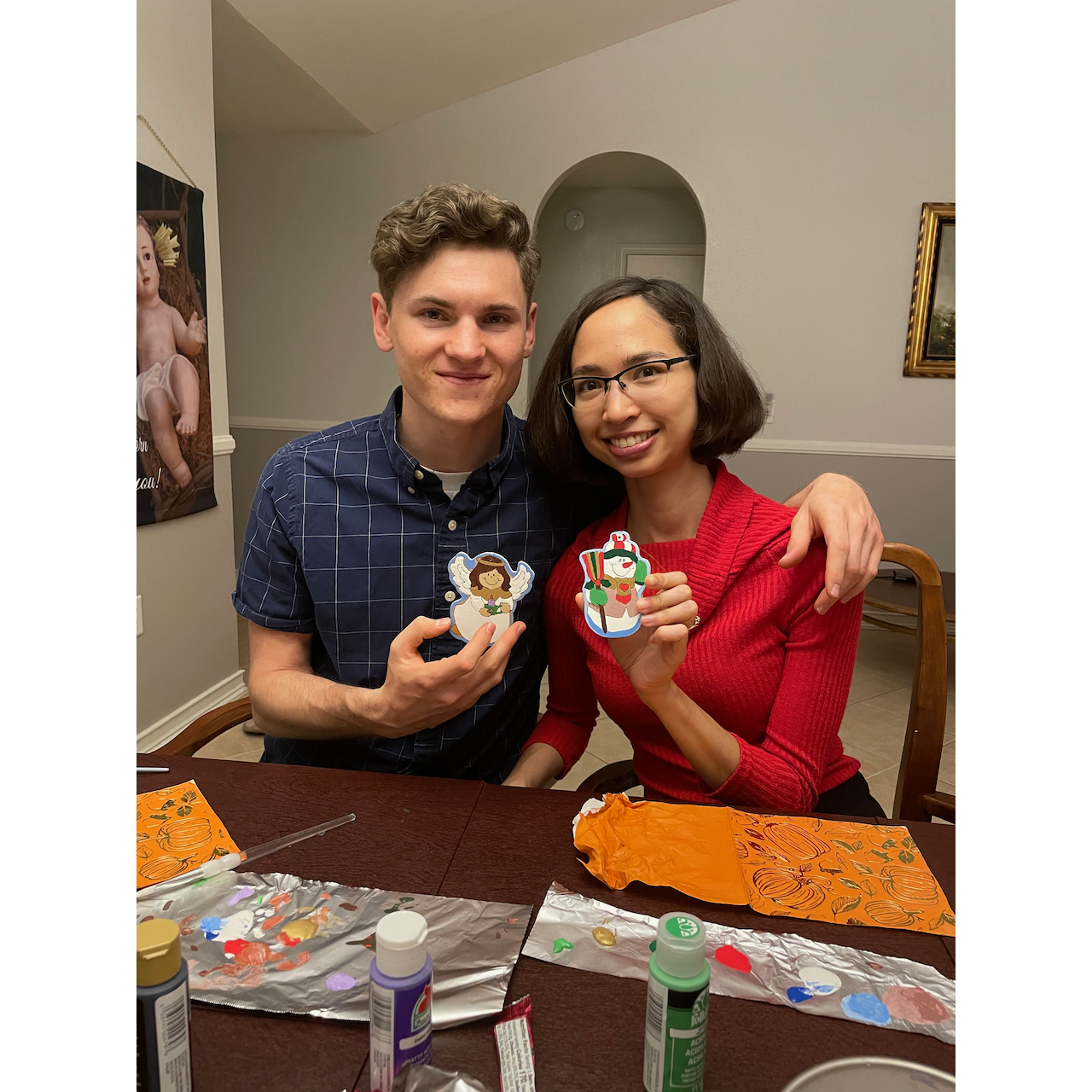 Painting ornaments together for Christmas