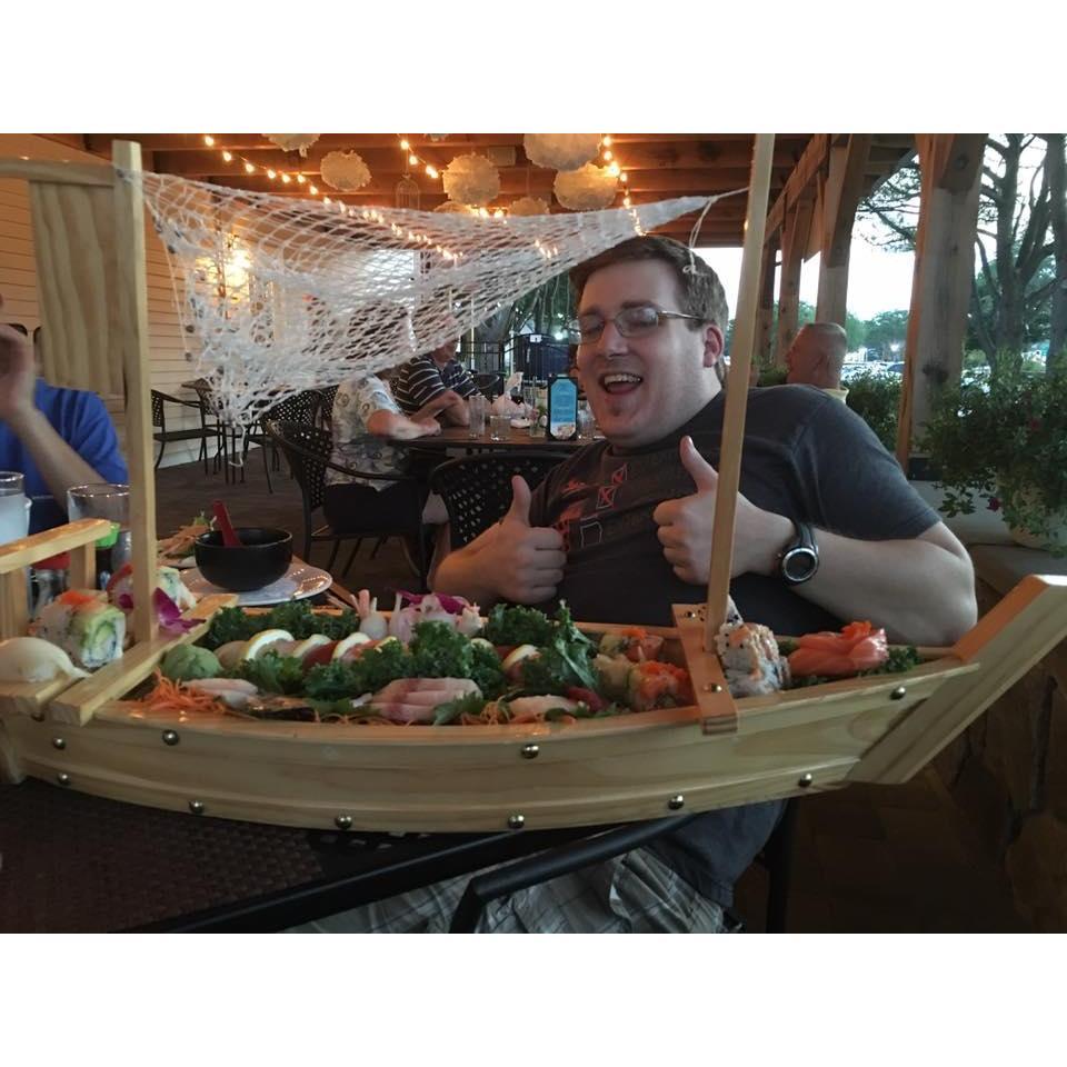 Sushi with Keith and Kaitlyn! I swear they're there, but that boat was so amazing. I think you can see Keith's arm though...