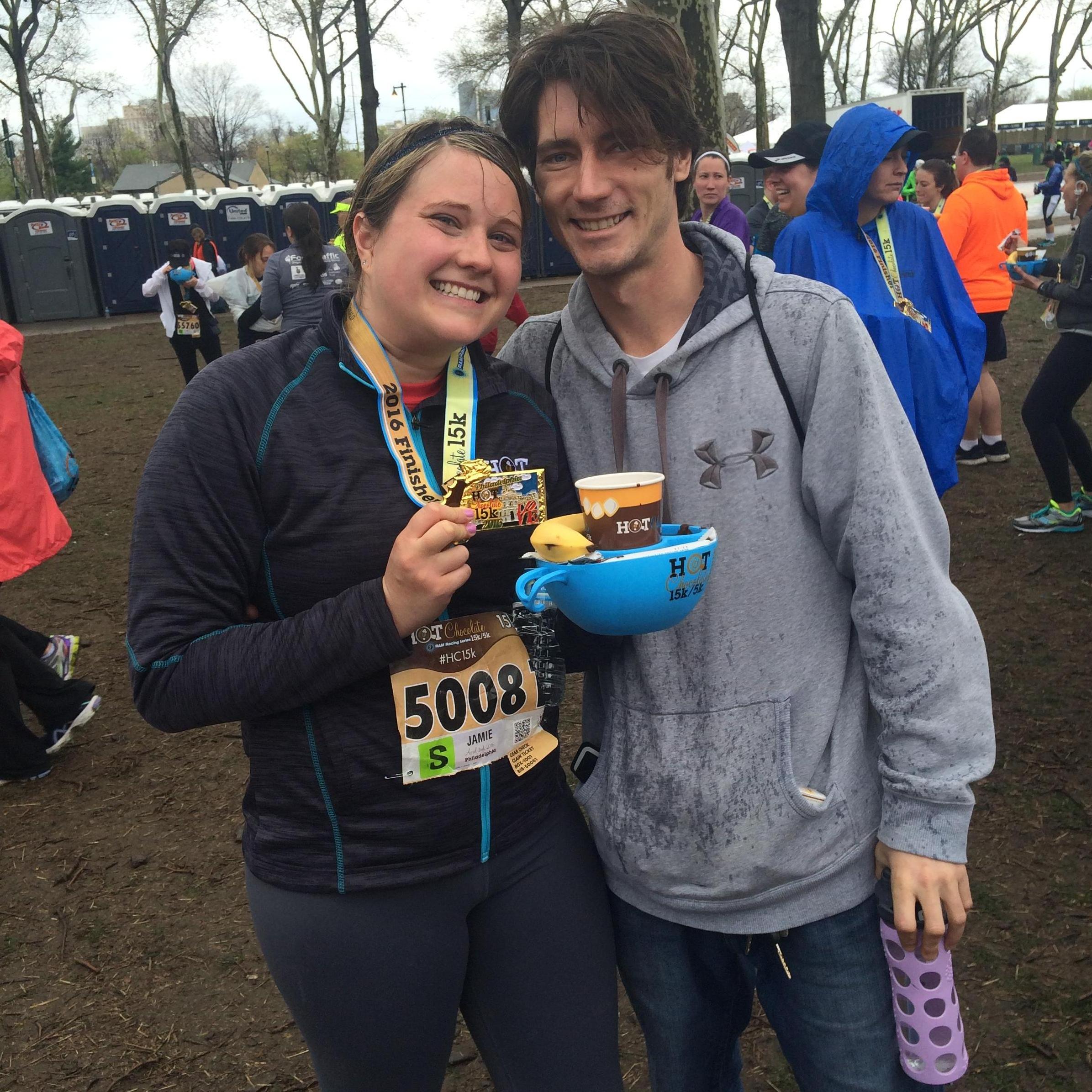 Adam being a great support (in the rain) while Jamie ran her first 15K