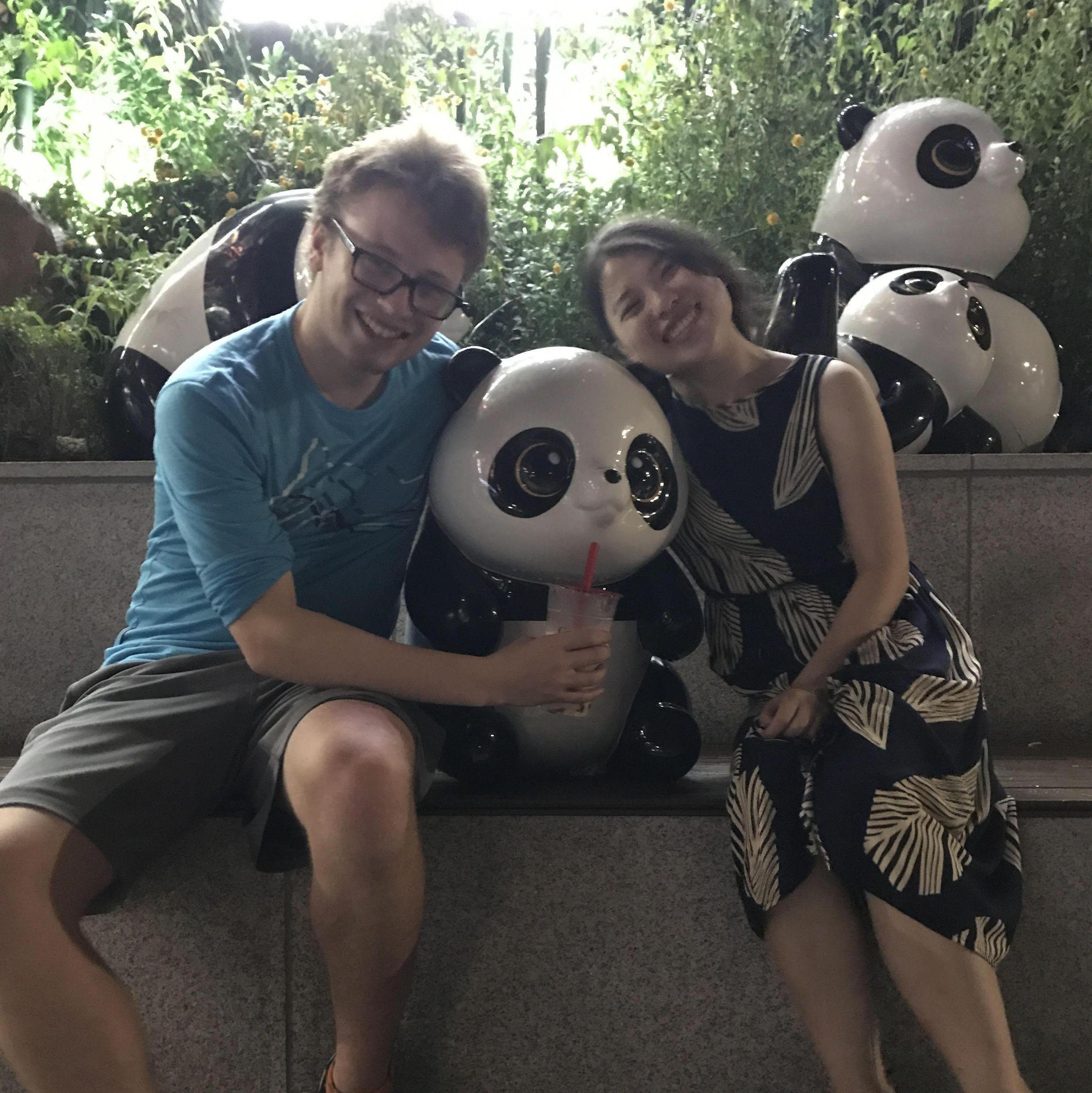 August 2017 (Chengdu, China - Panda Research Center): Emily's three loves: pandas, bubble tea, and Alistair