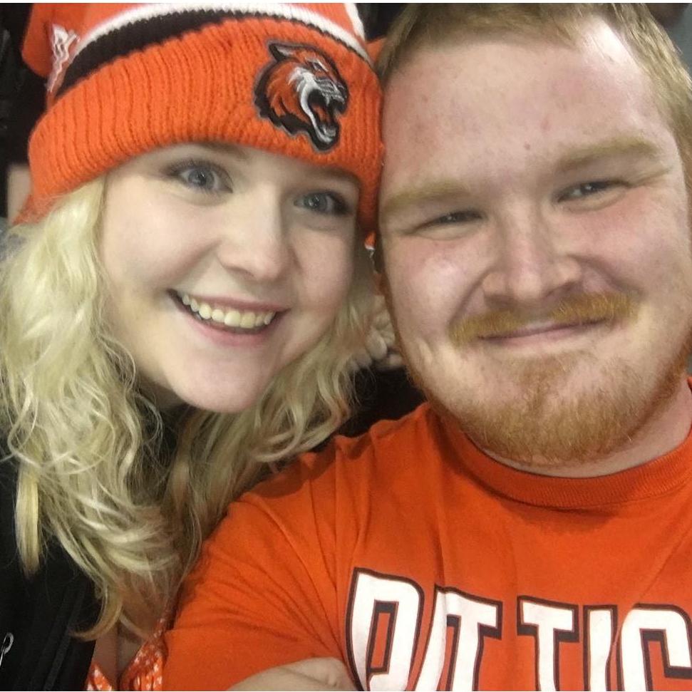 Sporting alumni pride at an RIT Hockey Game