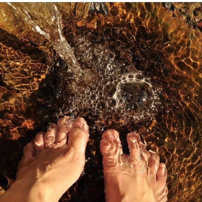 The bride sits on a stool on the day of the wedding and a happily married woman would wash and dry her feet. Then would drop a ring into the water. The first single lady to find it would marry's next
