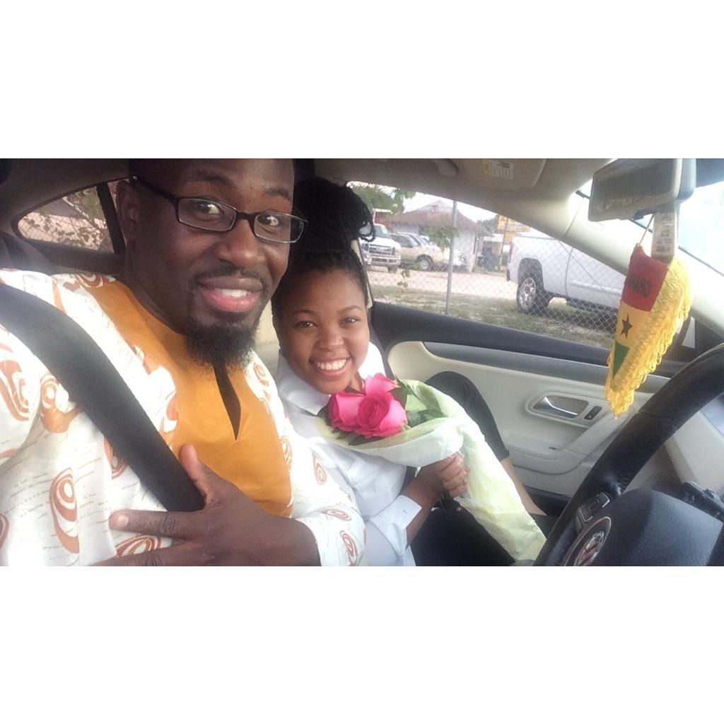 Michael picking up Tennian from the airport with flowers after a two week work trip!