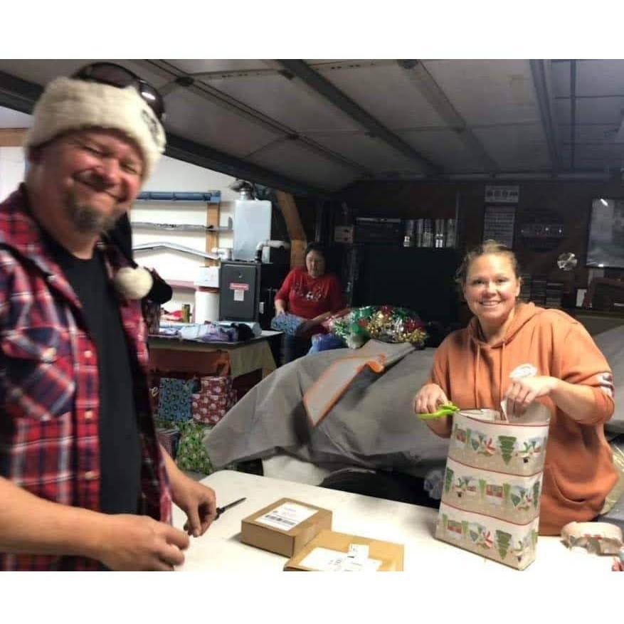 Volunteering for Rachael's Angels, wrapping gifts for kids in need of a good Christmas 2021.