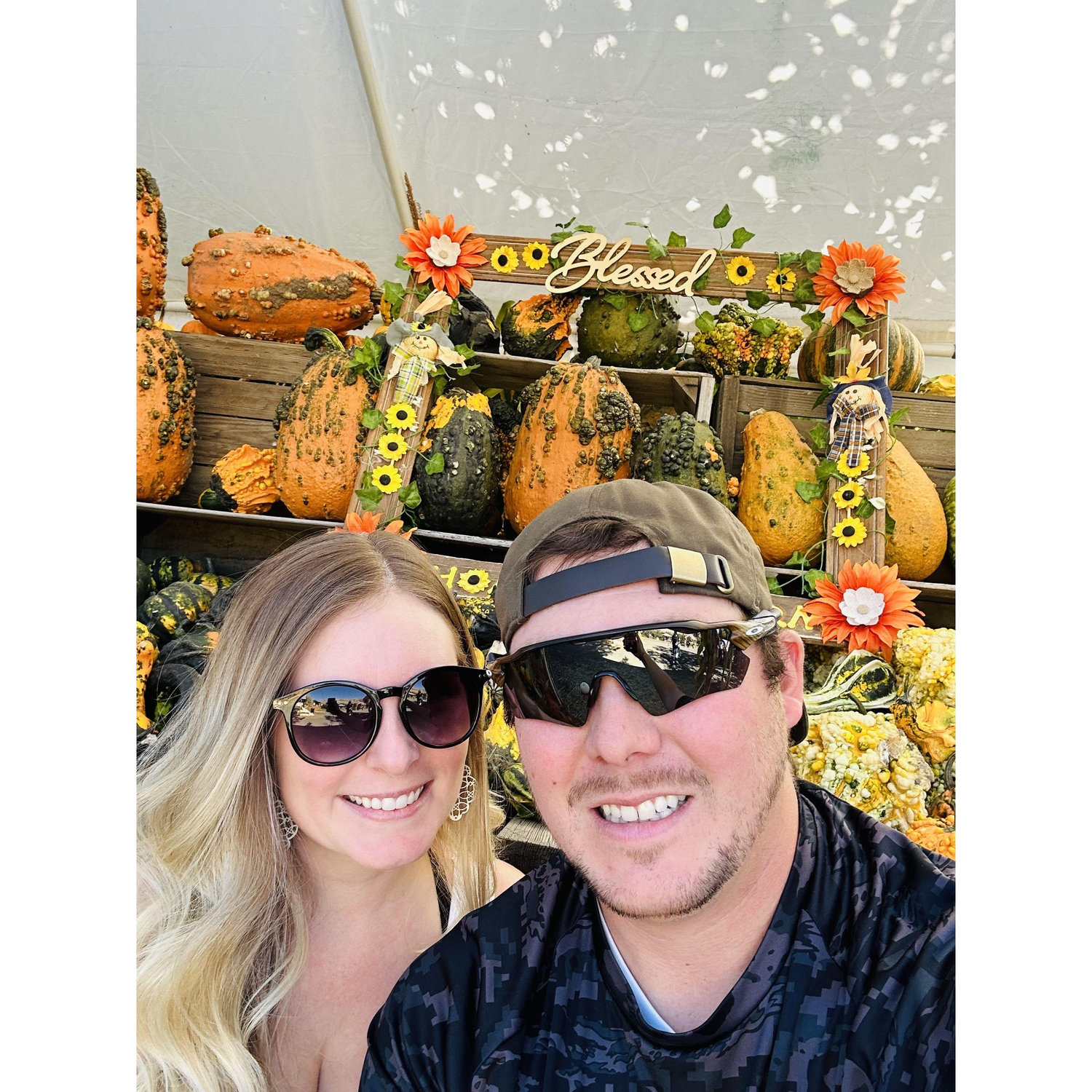 Jessica and Zac at Thompson Farms. It is their yearly tradition to go to the pumpkin patch.