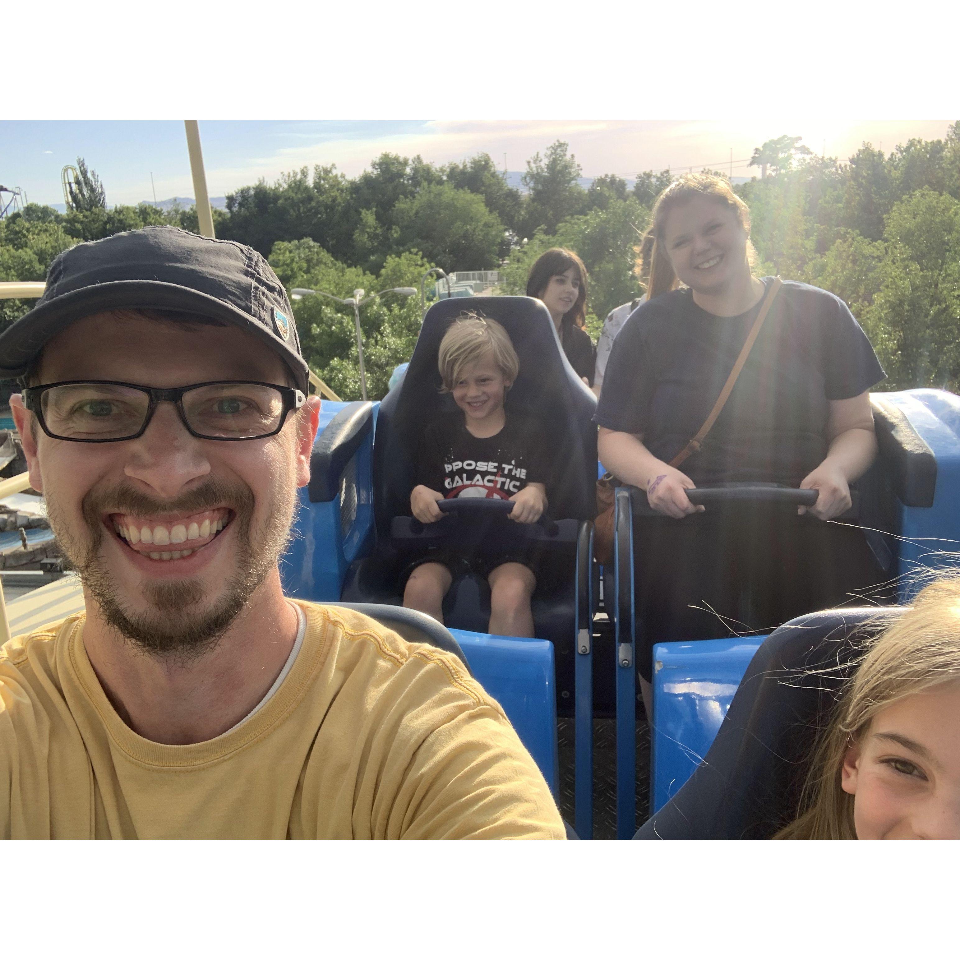 Riding rollercoasters at Lagoon amusement park.