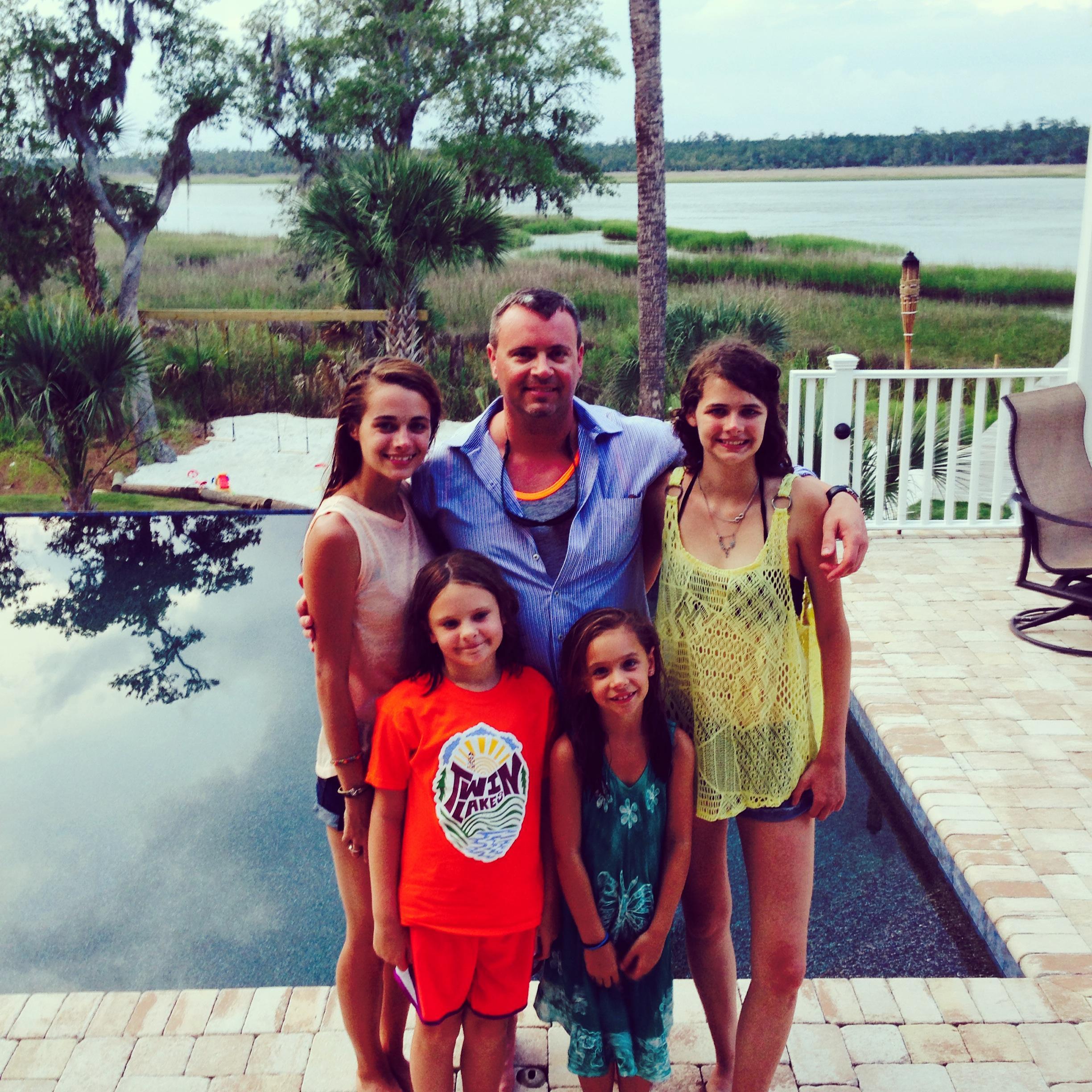 Jades Dad and younger sisters on 4th of July
