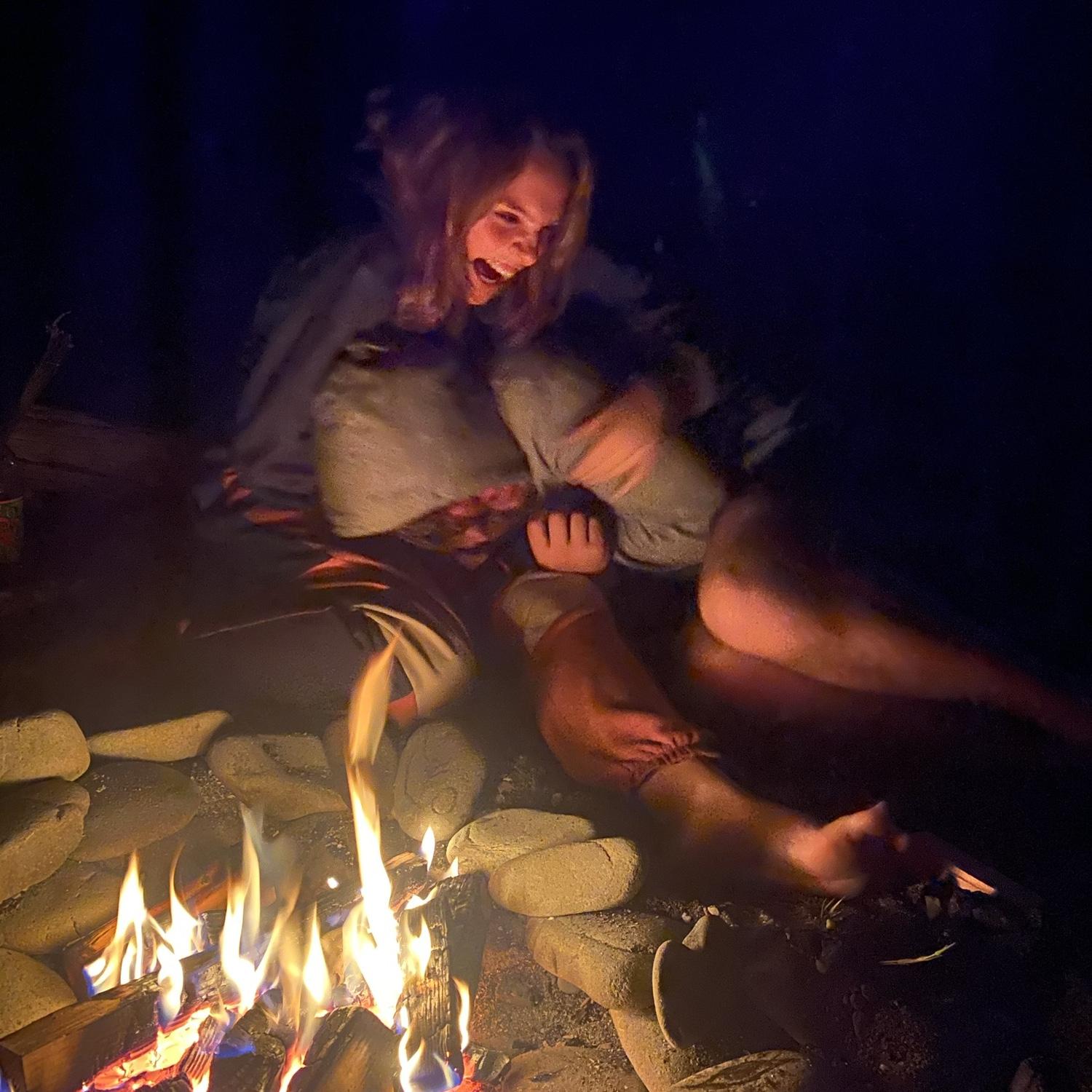 This was before we started dating, we went camping with friends and sang around the campfire while roasting s’mores!